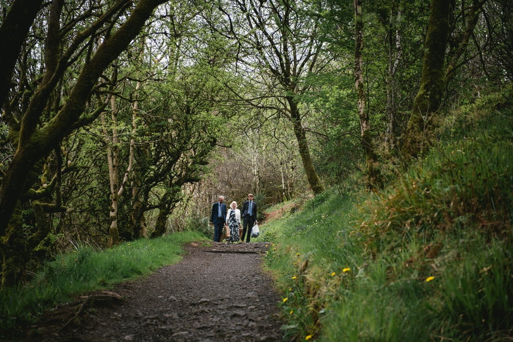 Group walking in the forest on an elopement day in Northern Ireland
