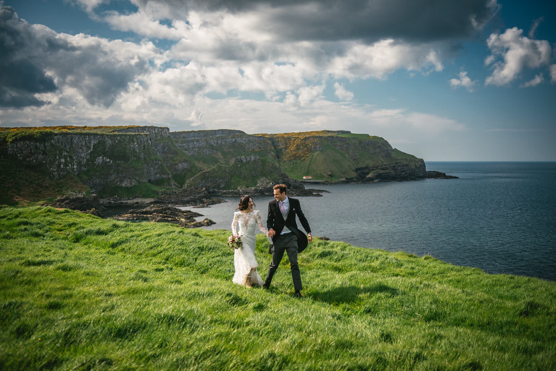 Candid shot of the couple laughing together during their Northern Ireland elopement.