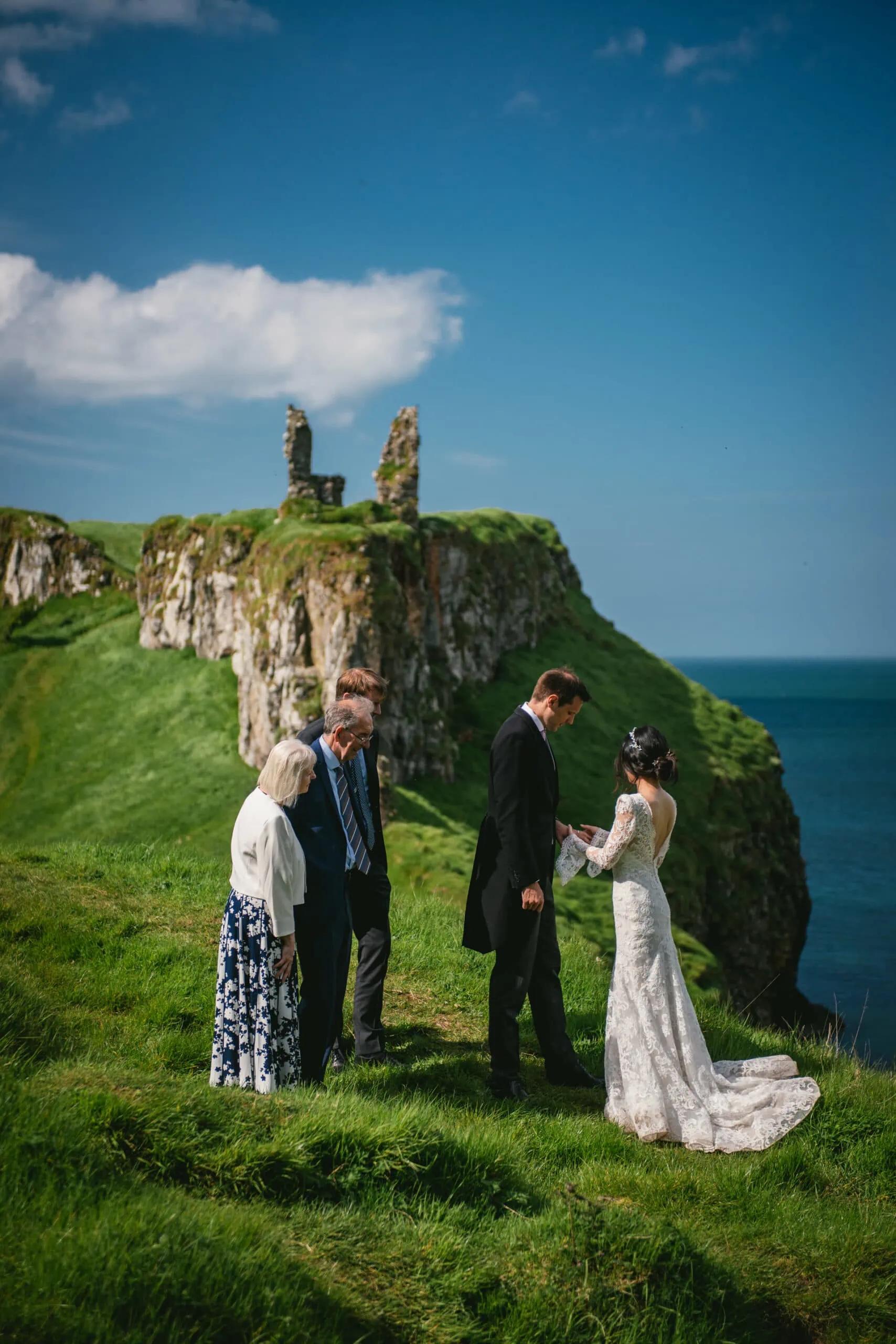 The bride's beaming smile as she walks hand in hand with her partner during their Northern Ireland elopement.