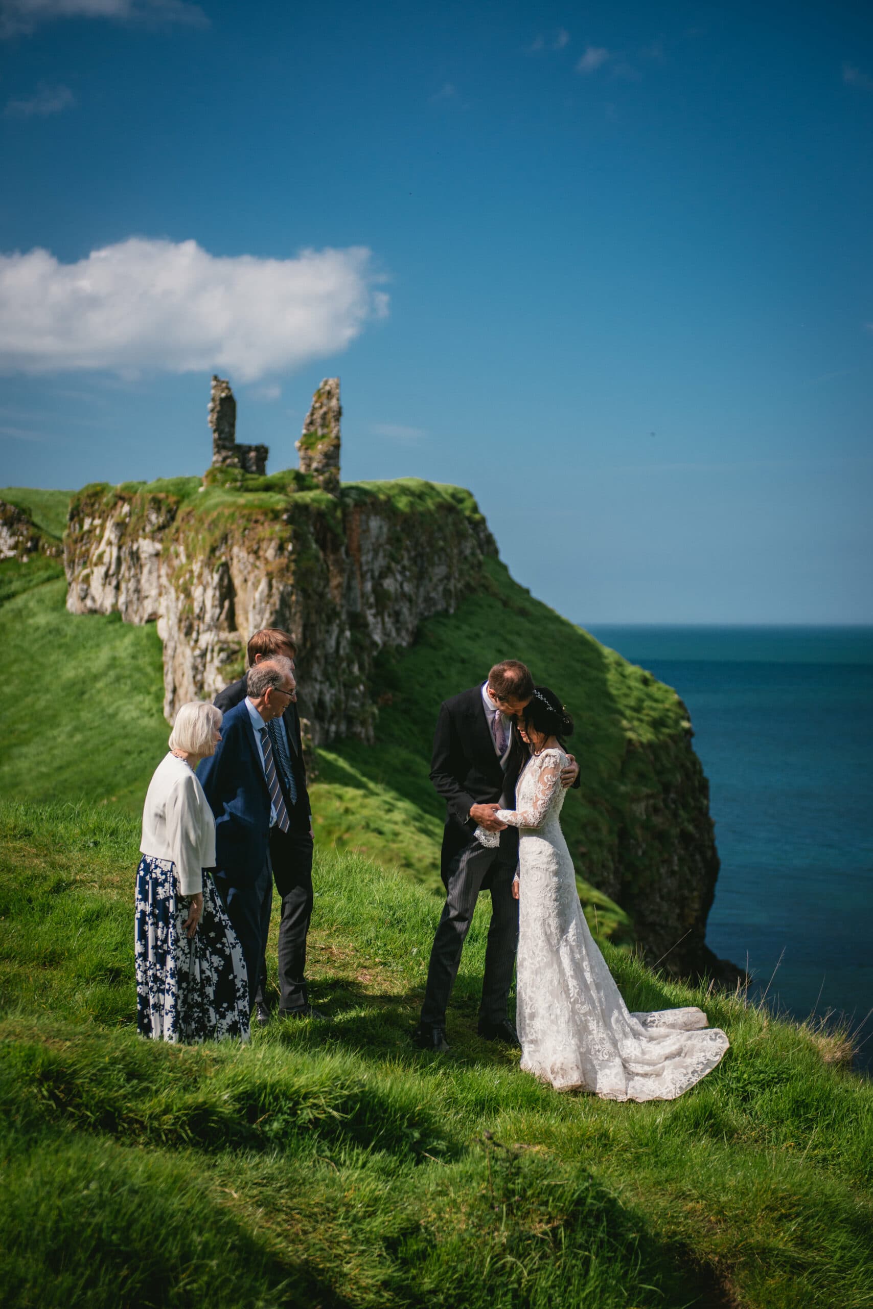 Glimpse of the couple's intimate wedding ceremony at Dunseverick castle during their Northern Ireland elopement.