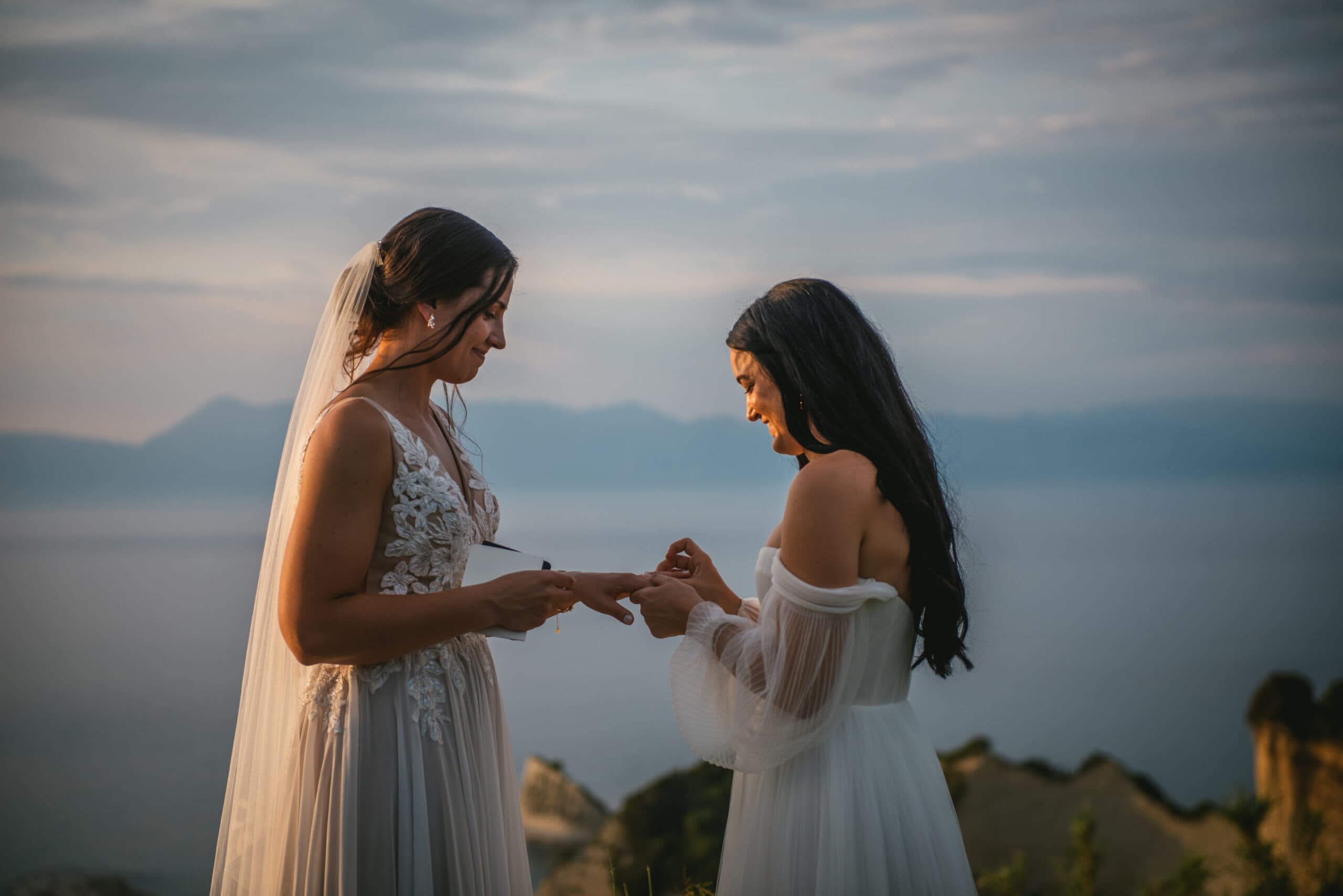 A touching moment as rings are exchanged in the Corfu elopement ceremony.