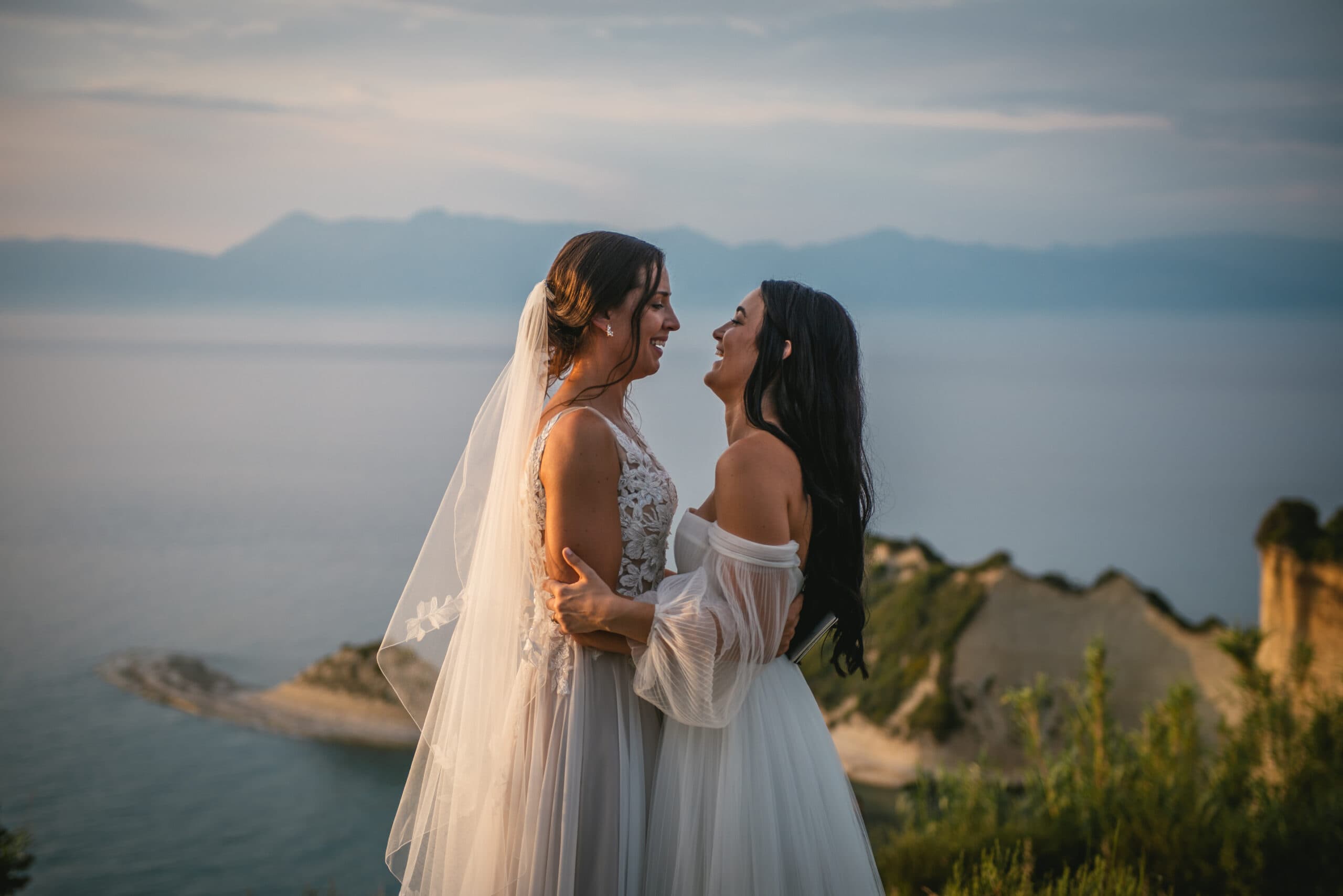 The couple's genuine smiles capturing the essence of their Corfu elopement ceremony.