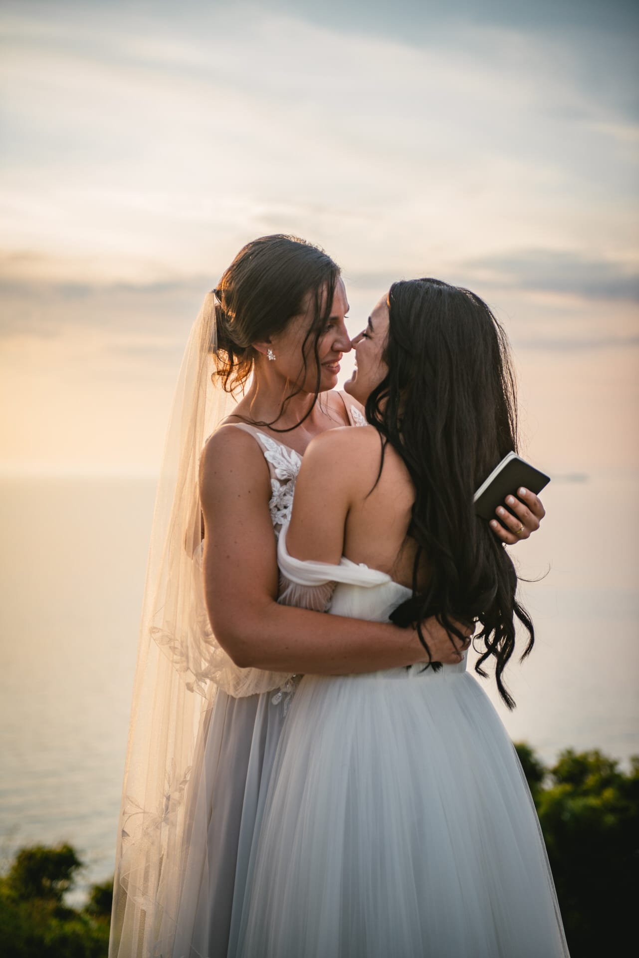 A heartfelt exchange of vows under the Corfu sun during their ceremony.