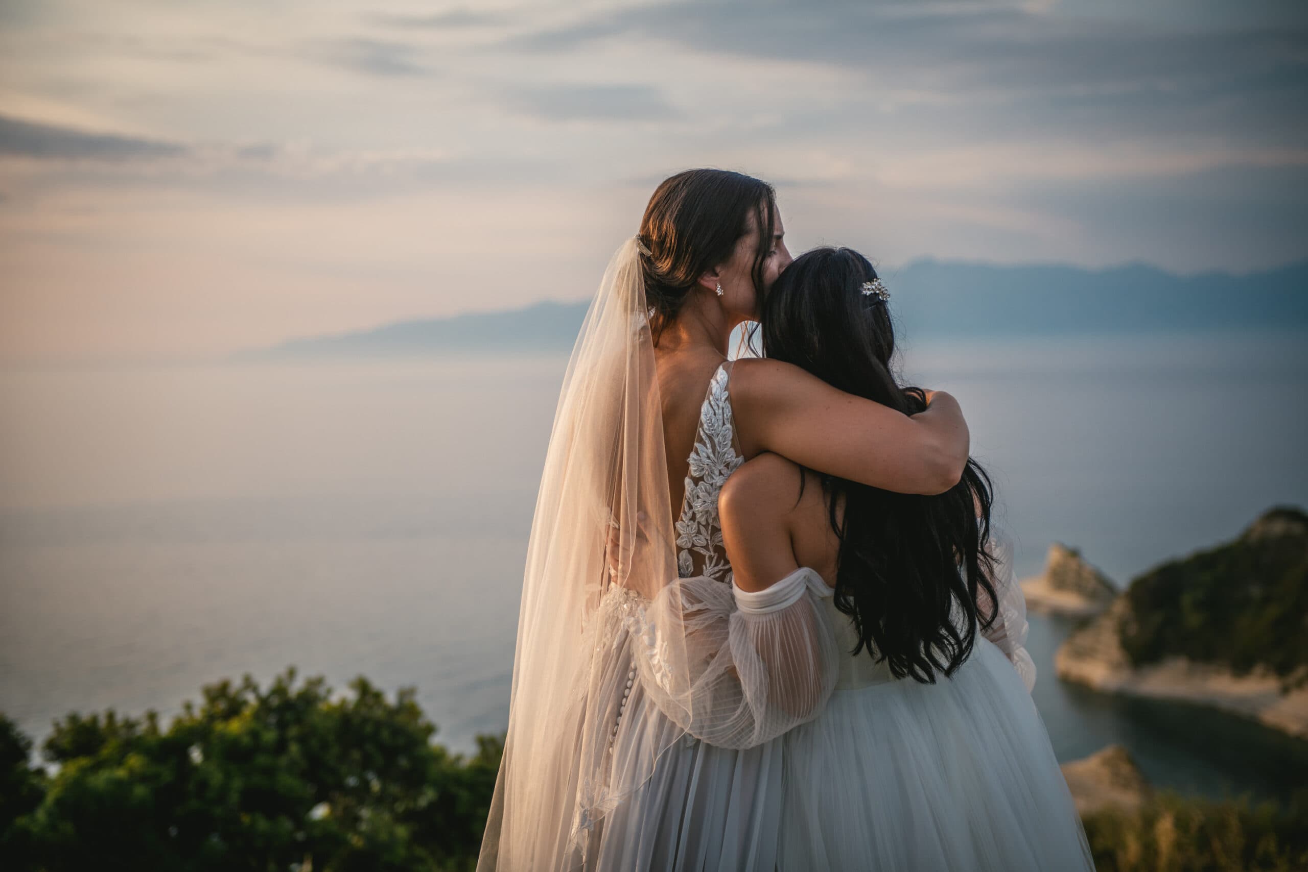 The couple's love story unfolds in the tender moments of their Corfu elopement ceremony.
