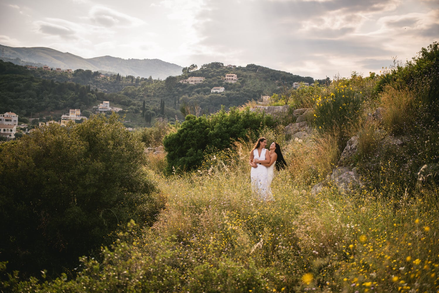 An unexpected encounter: brides spot two brown snakes while strolling by the sea in Corfu.