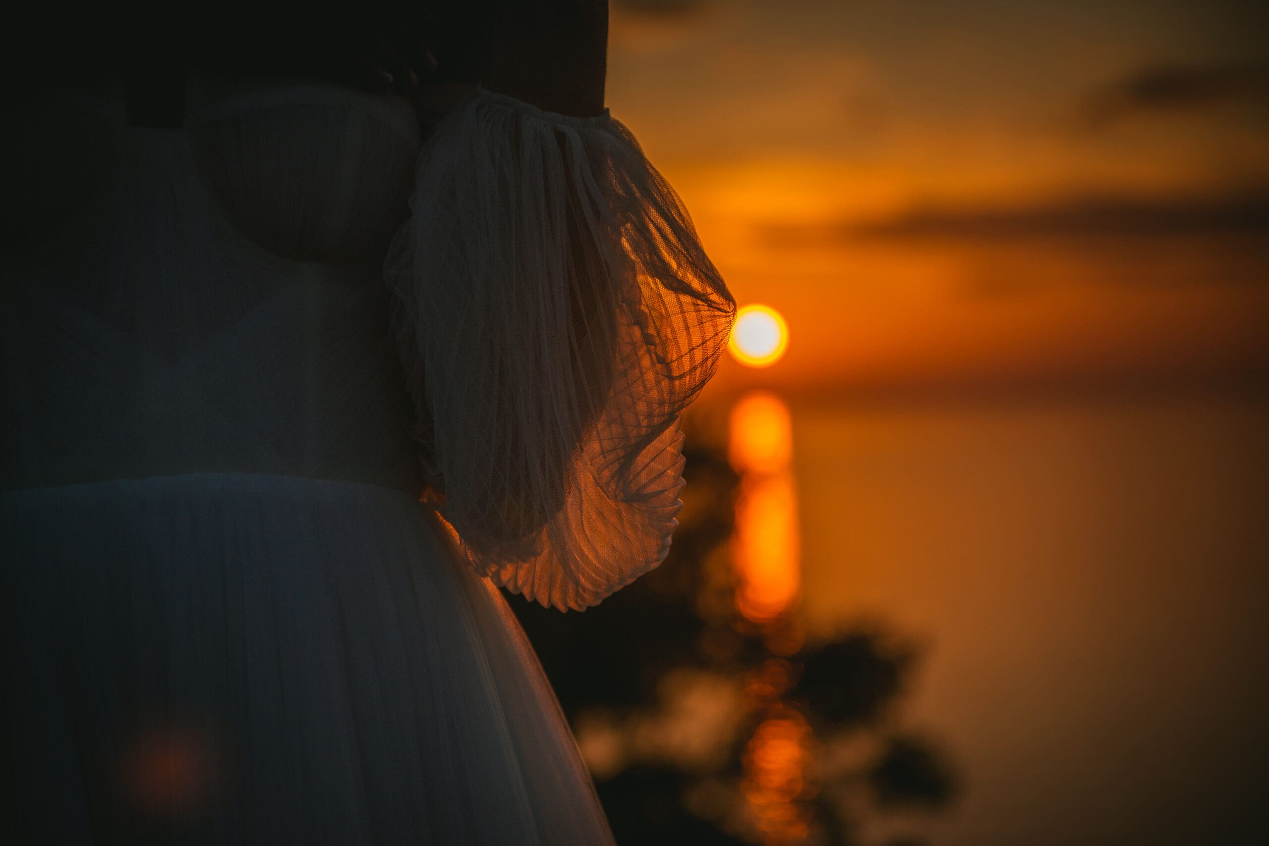 Exquisite details of the bride's dress, capturing the elegance of their Corfu elopement.