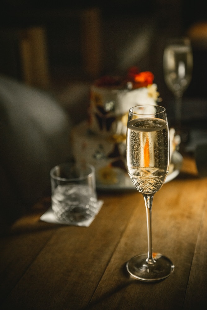 Detail of the bride's champagne glass, a toast to their memorable Corfu elopement.