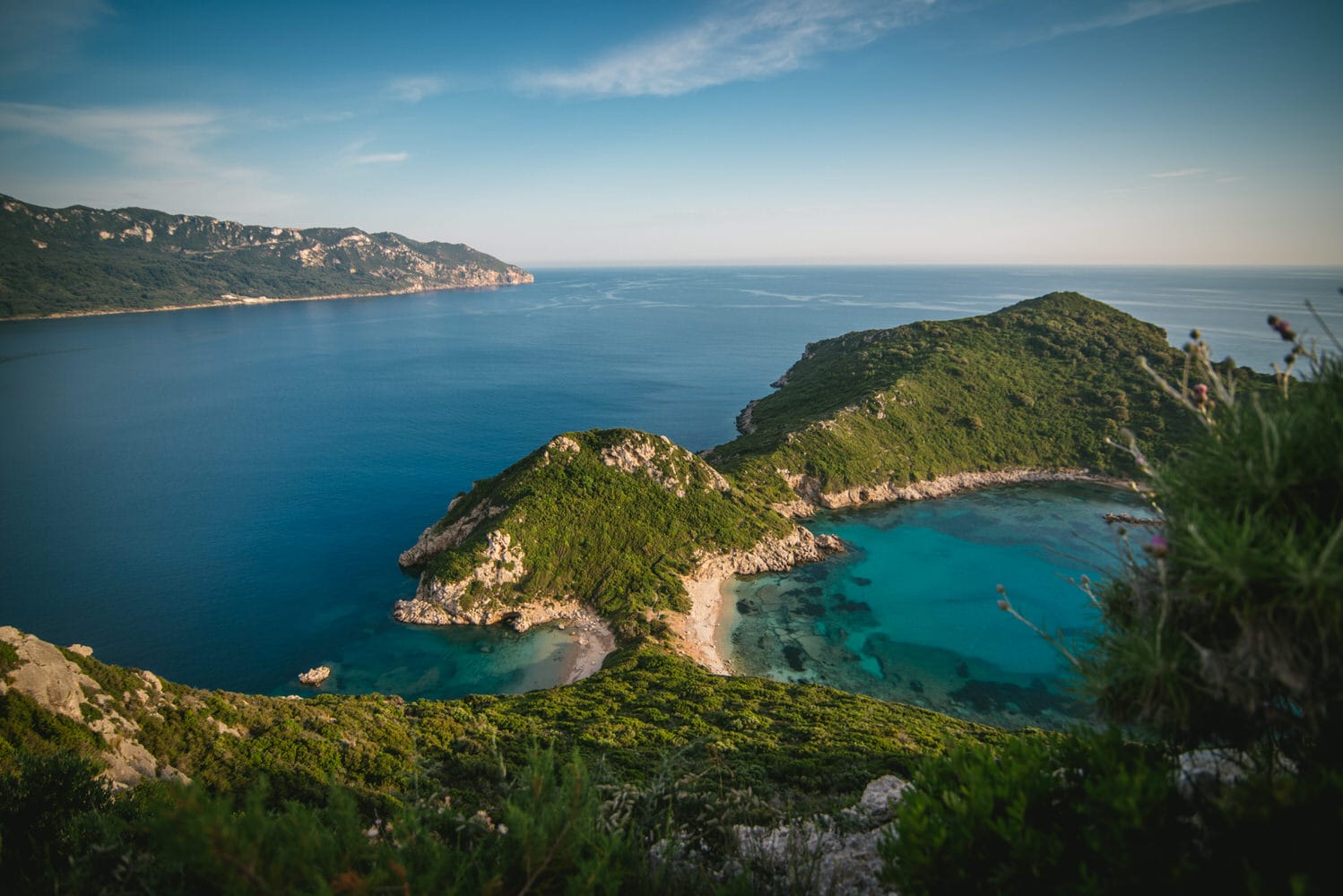 Detail of a serene peninsula, adorned with white sand beaches, during their Corfu elopement.