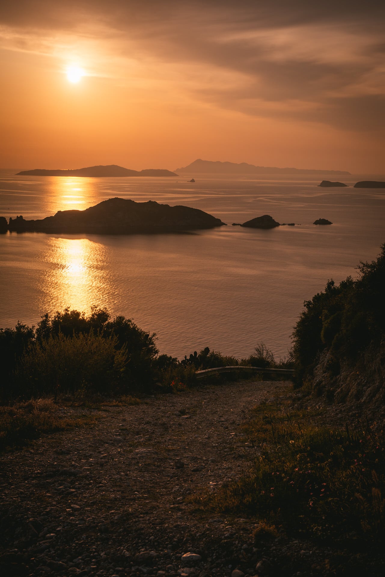 The stunning hues of sunset over the Corfu islands, a magical scene during their elopement.