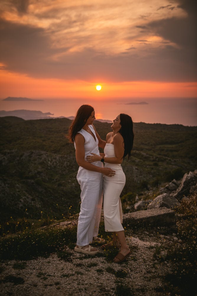 Guided by winding roads: Brides' journey to Mount Pantokrator, love leading the way during their Corfu elopement.