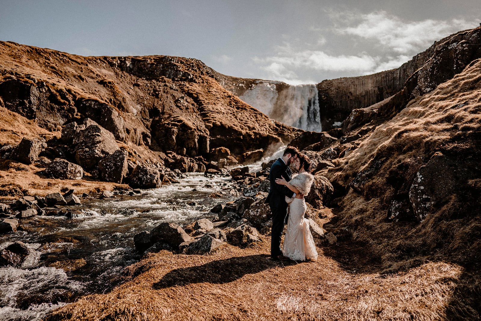 Elopement Magic: Bride and Groom Creating Memories in Western Iceland