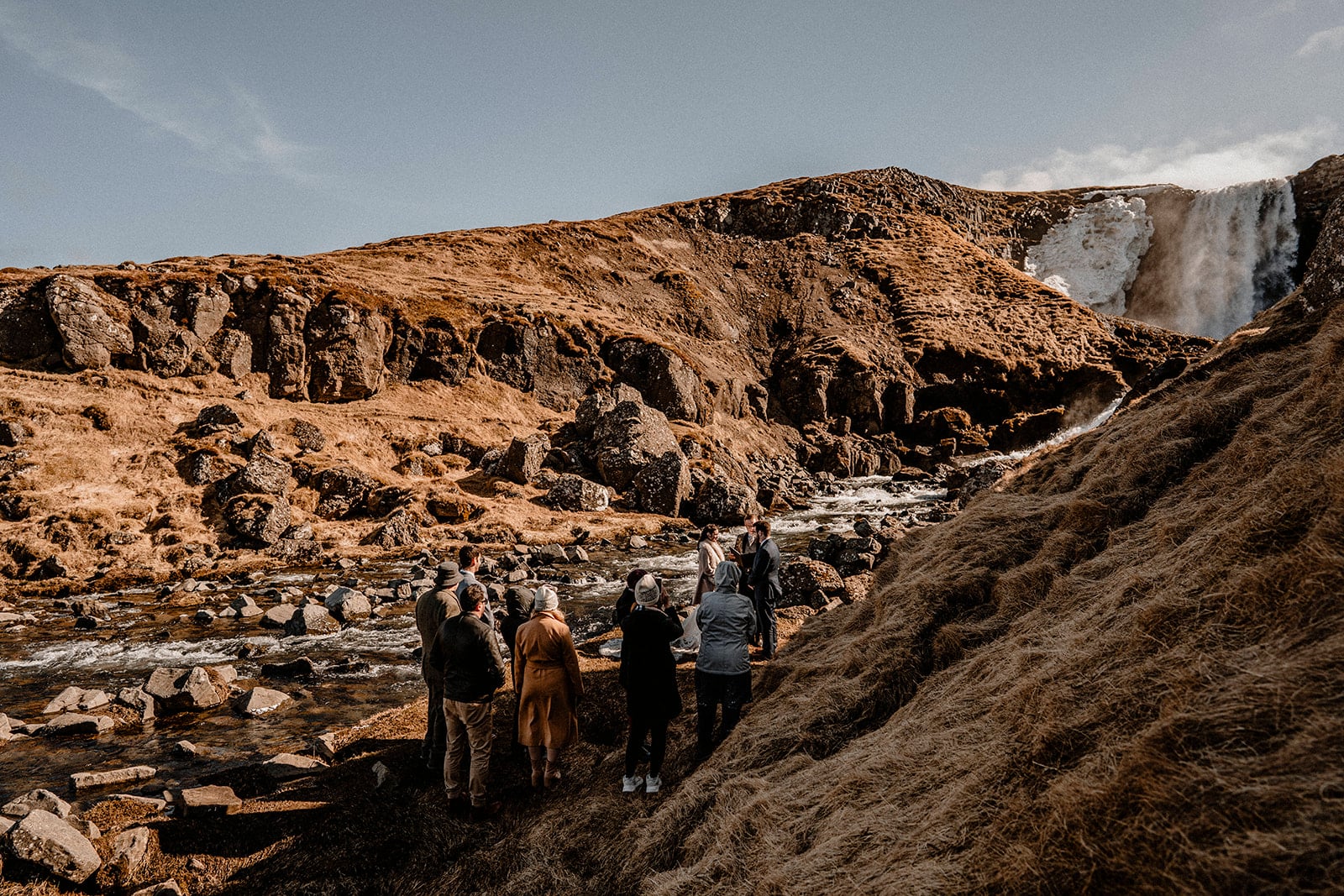 Enchanted Moments: Bride and Groom Embracing Love in Western Iceland