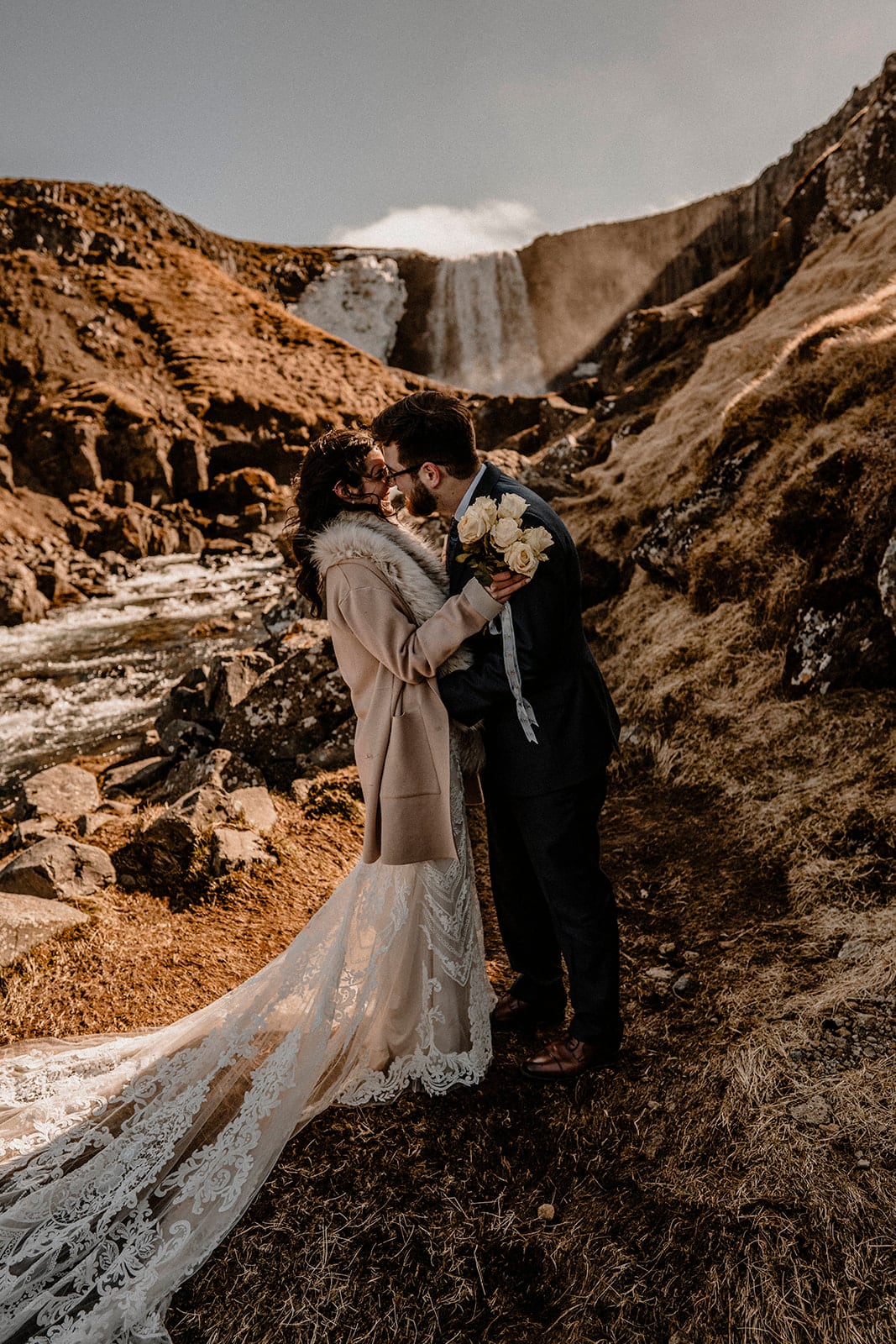 Nature's Embrace: Bride and Groom Captured in Western Iceland's Charm