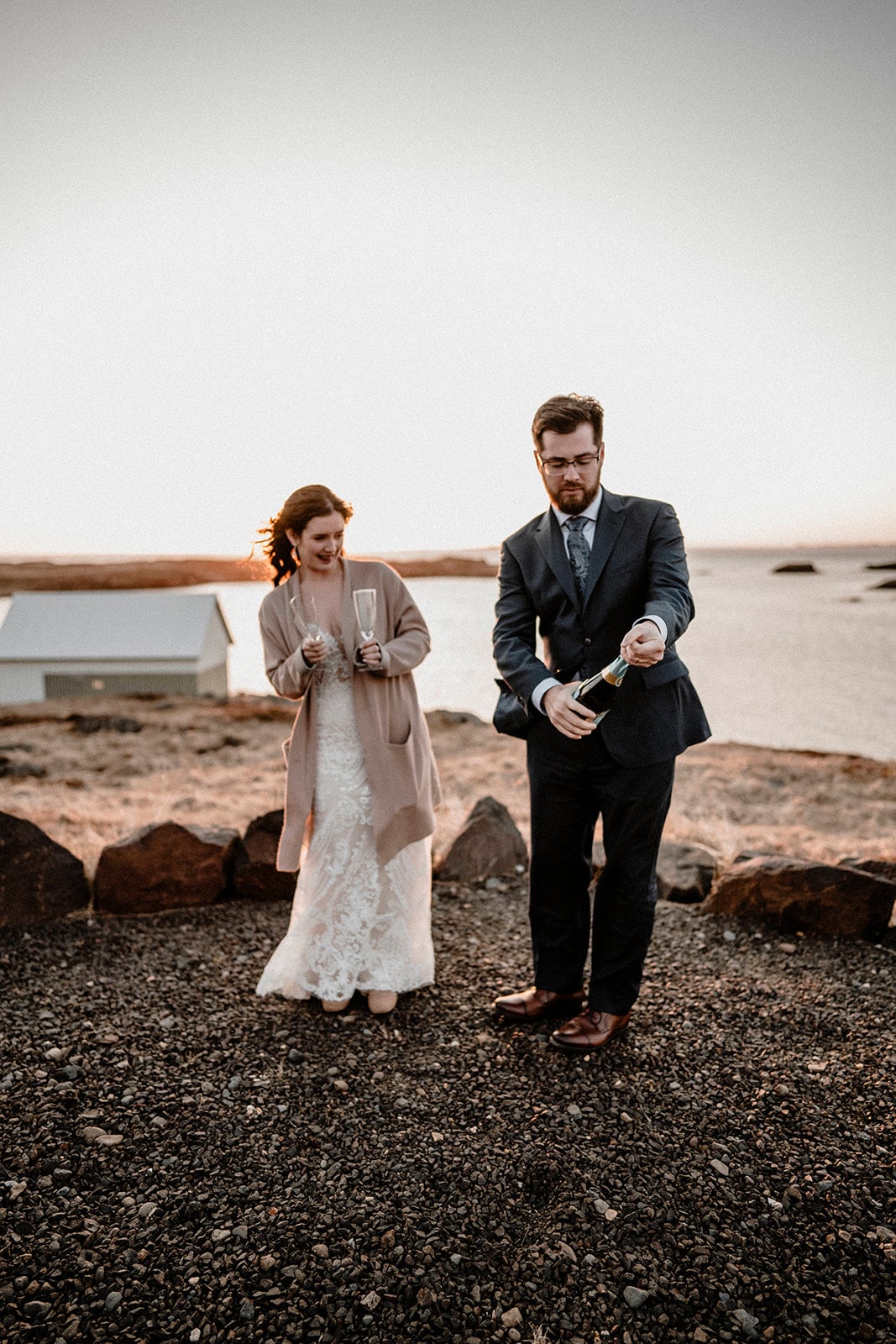 Sunset Elopement: Bride and Groom Embracing Western Iceland's Magic