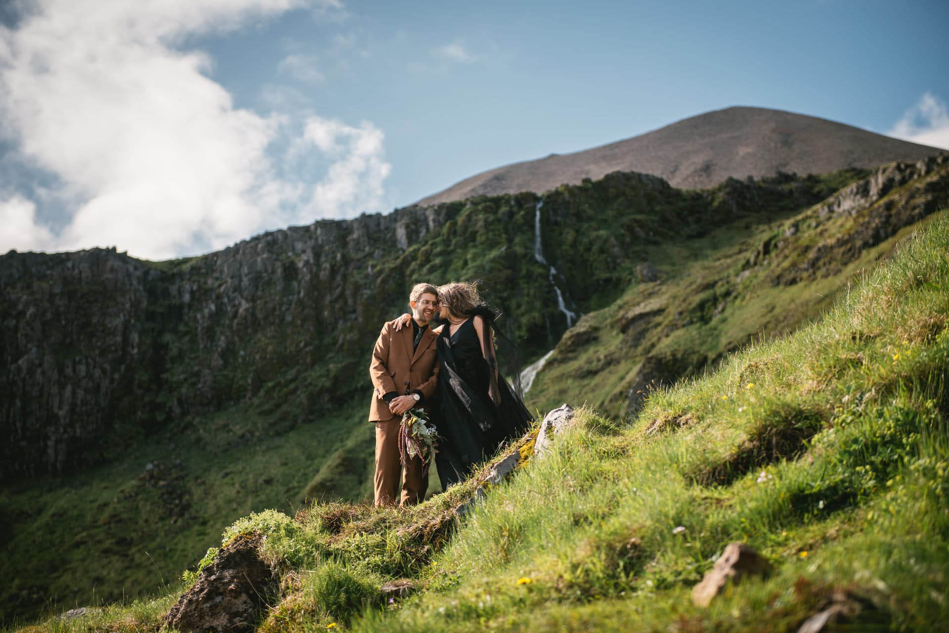 Windswept kisses shared atop a picturesque Westfjords cliff.
