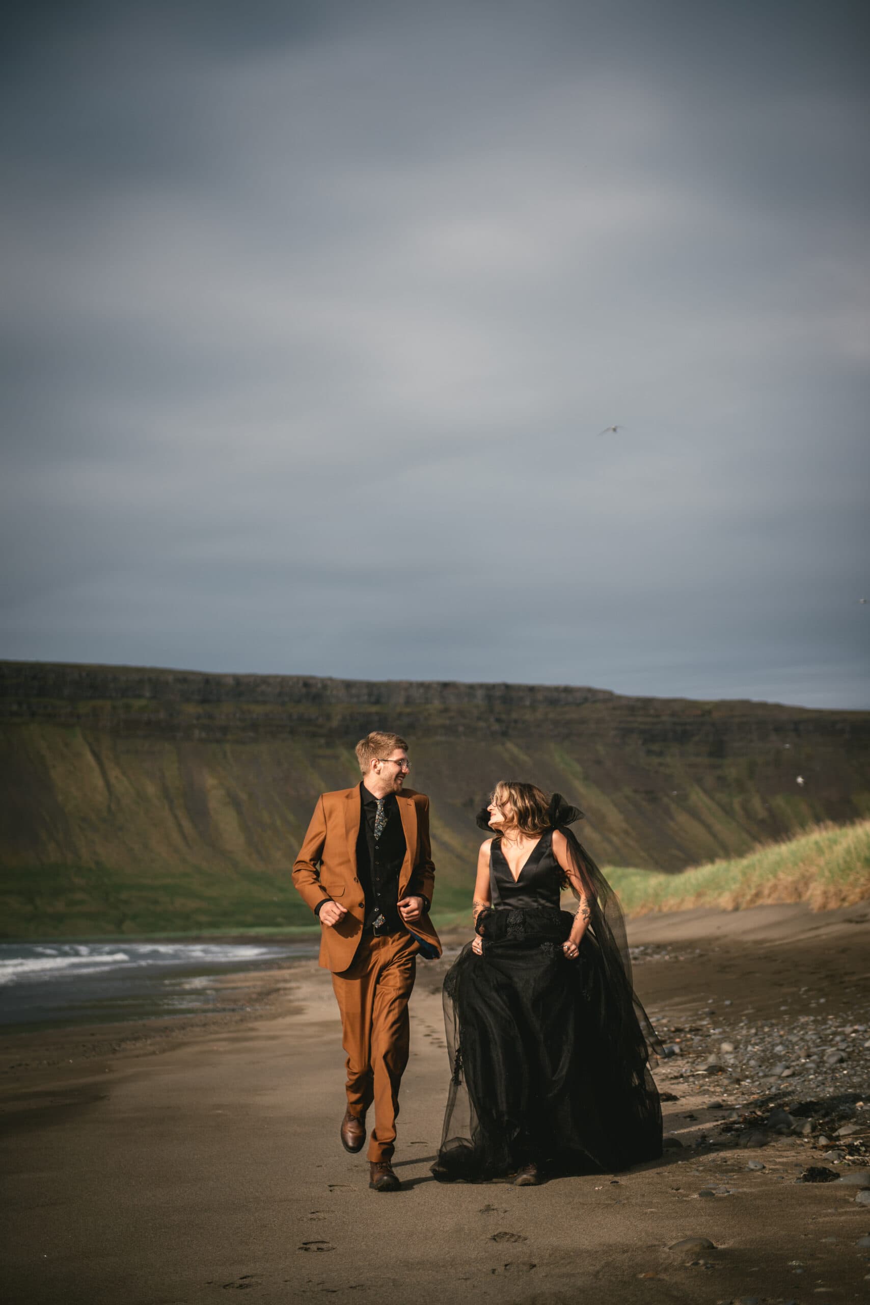 Candid shot of the couple's joyful celebration in the heart of the Westfjords.