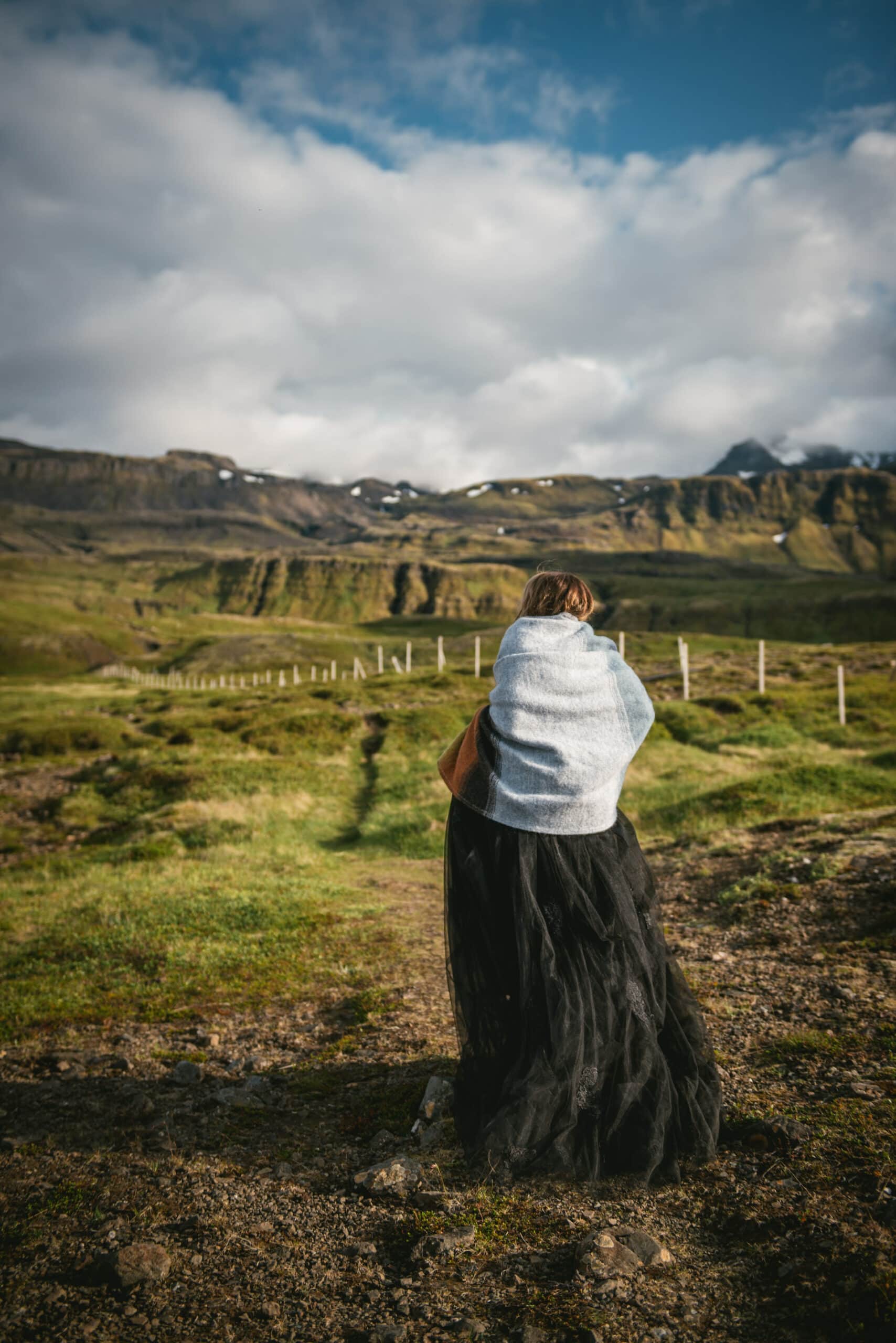 Loving gaze exchanged amid the beauty of the Icelandic wilderness.