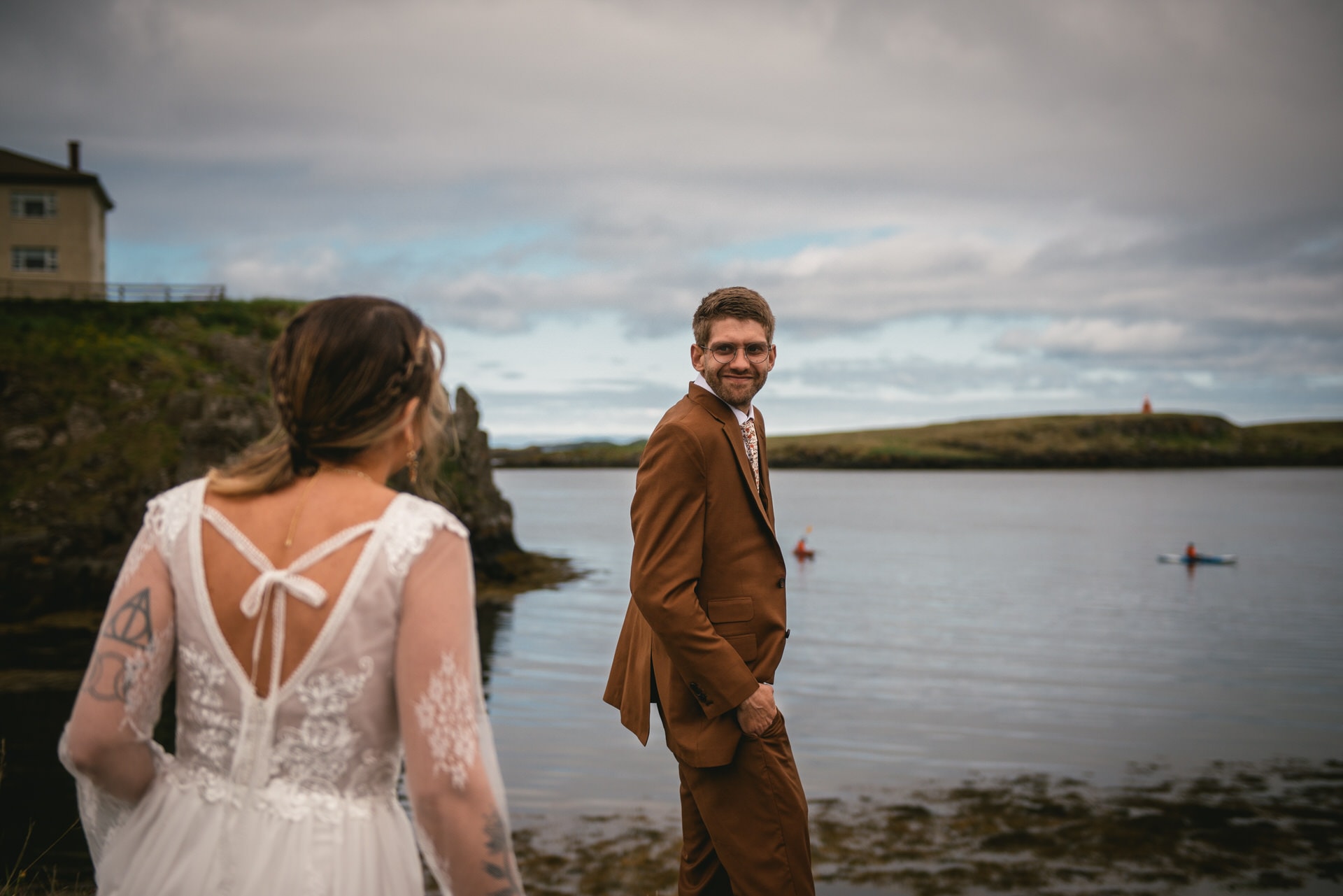 Bride and groom's love story etched against the backdrop of the Westfjords' untouched beauty.