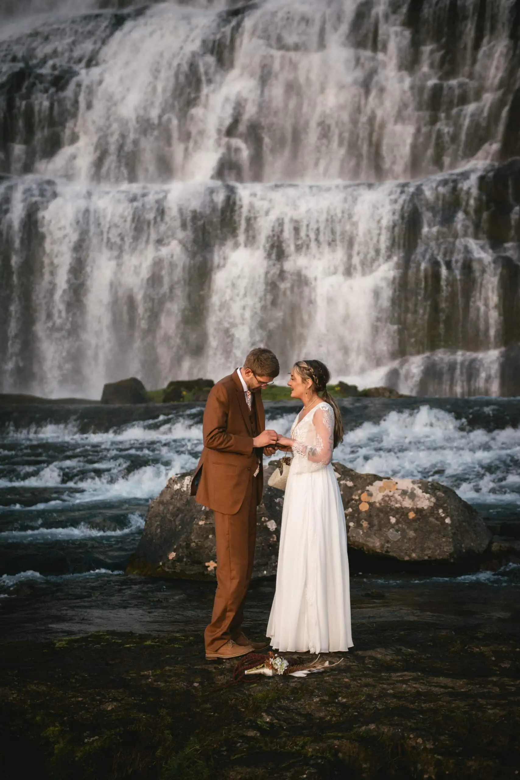 A glimpse of the couple's rings against the backdrop of Iceland's untamed landscapes.