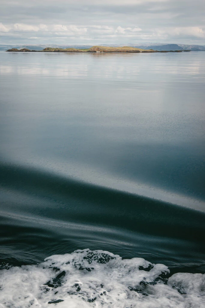 Waves whisper tales of their elopement adventure, as the ferry transports them from Westfjords' majesty to Snaefelseness' magical serenity.