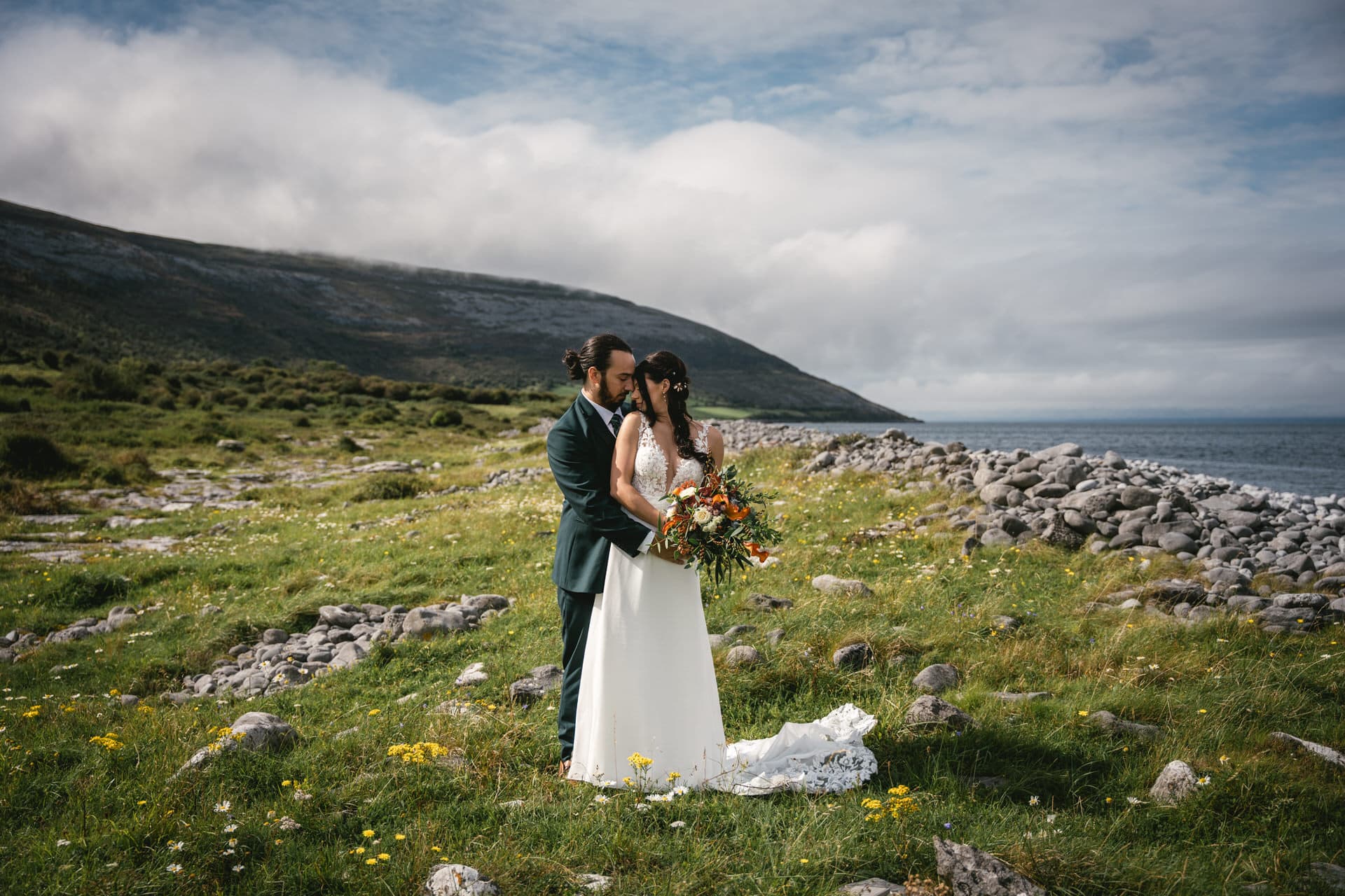 The misty Irish coast: A backdrop for their heartfelt vows.