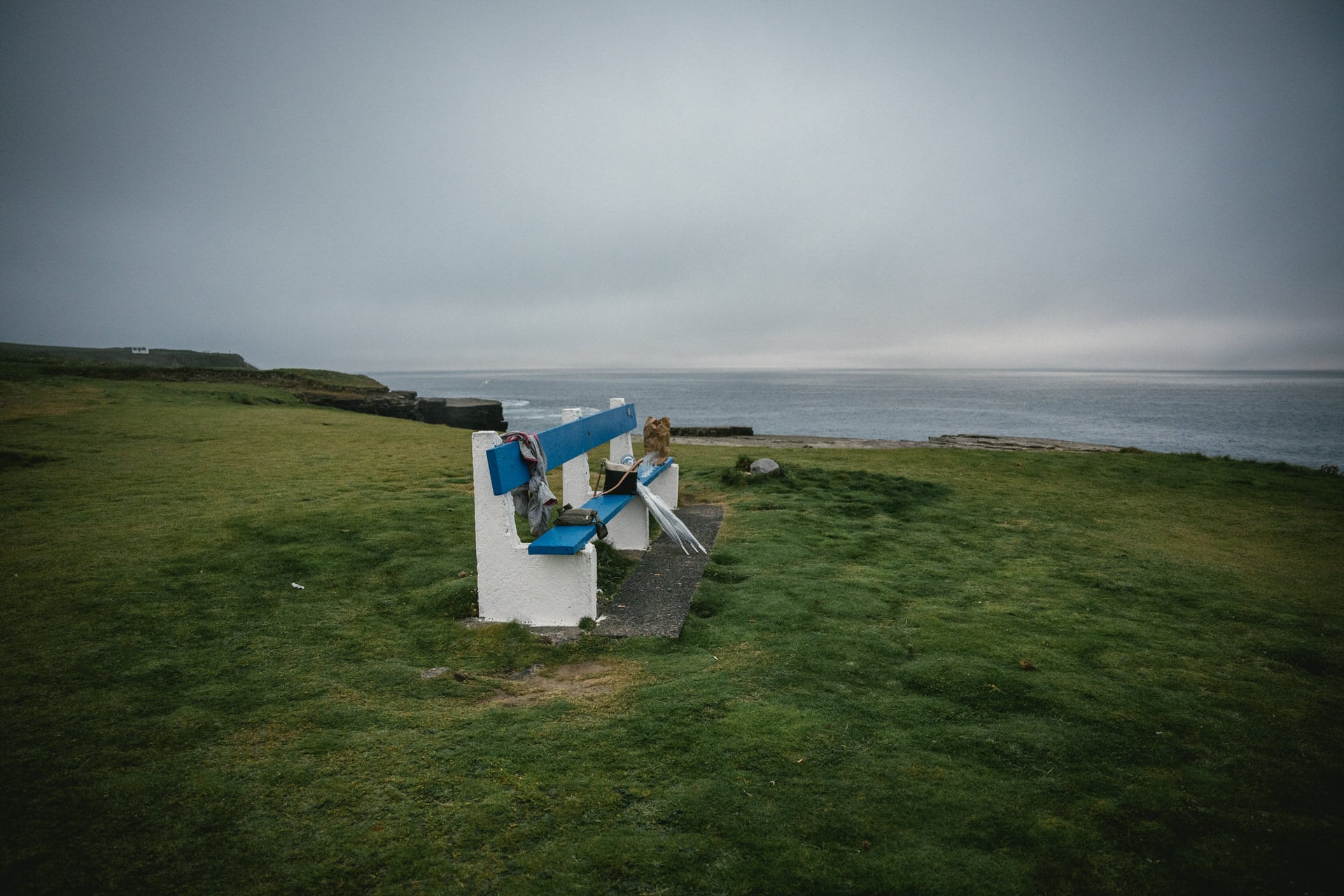 The misty Irish coast: A backdrop for their heartfelt vows.