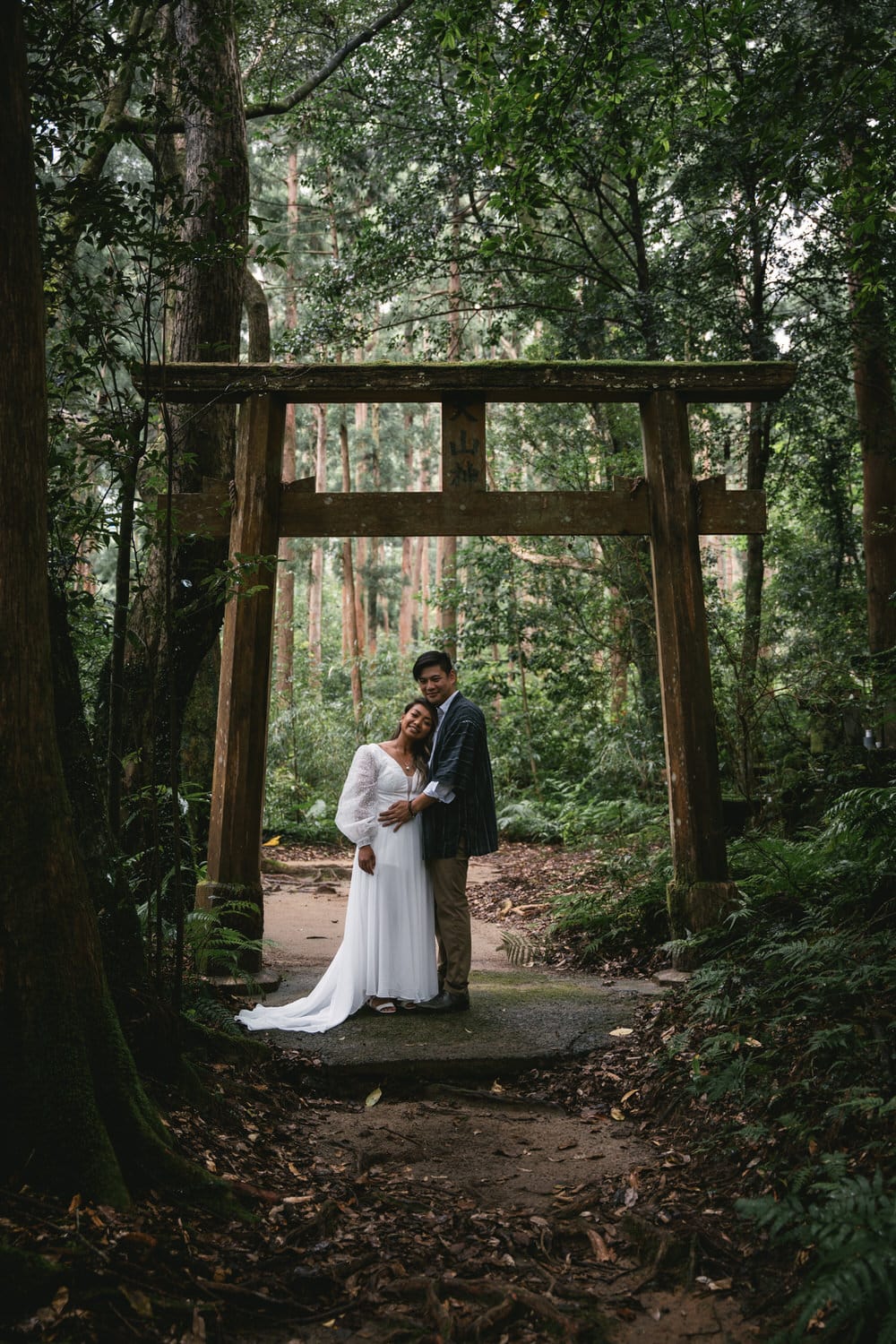 Wedding on Yakushima - couple photos by a Torii gate