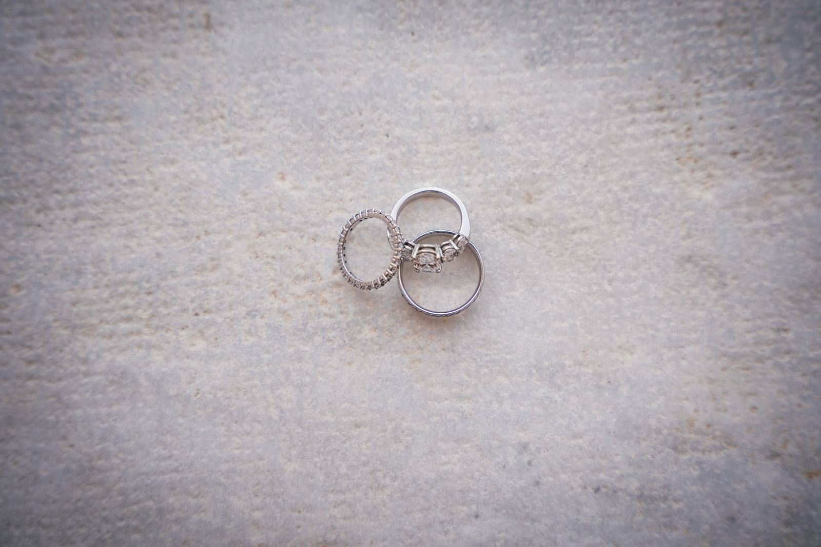 Symbolic wedding rings await their moment, promising eternal love on Santorini