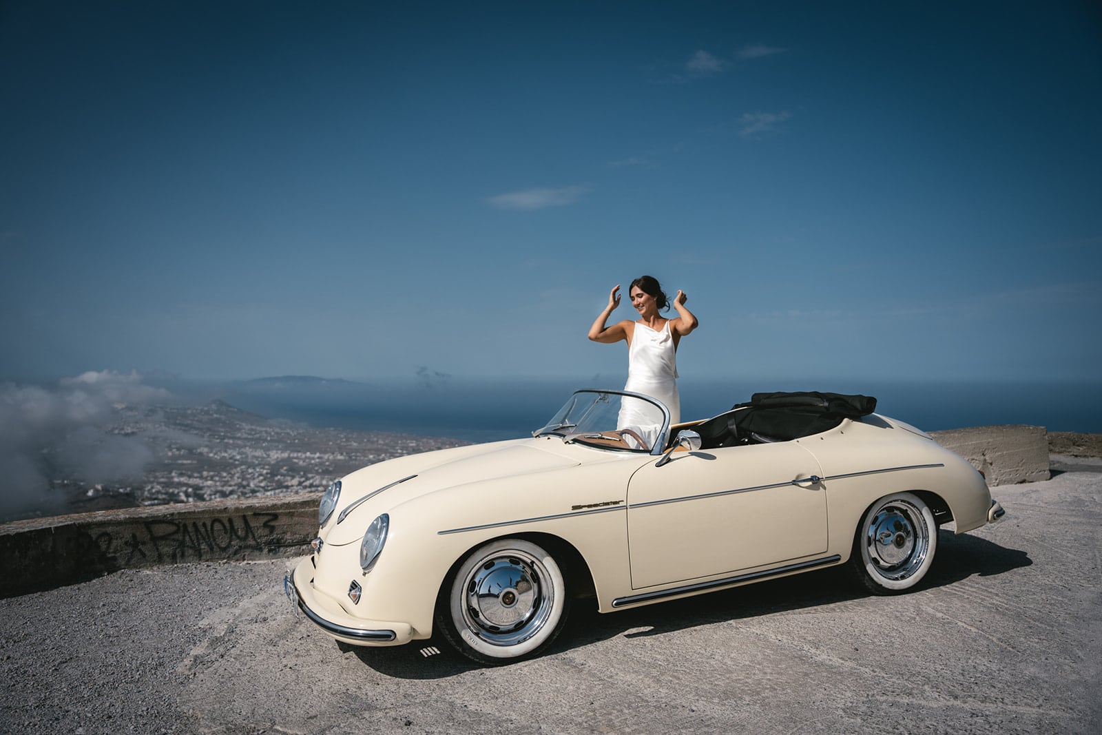 Elopement elegance: A vintage car, the endless sea, and two hearts in harmony