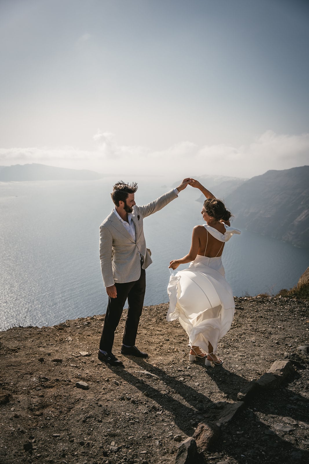 Entwined in a dance as the sea watches, their love story becomes a part of Santorini’s magic
