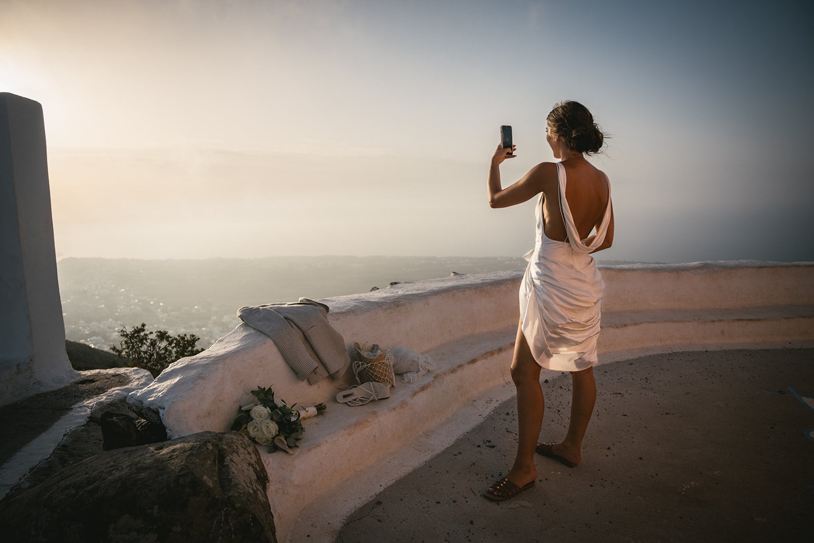 Every step towards their ceremony is a step closer to forever, under Santorini’s sky