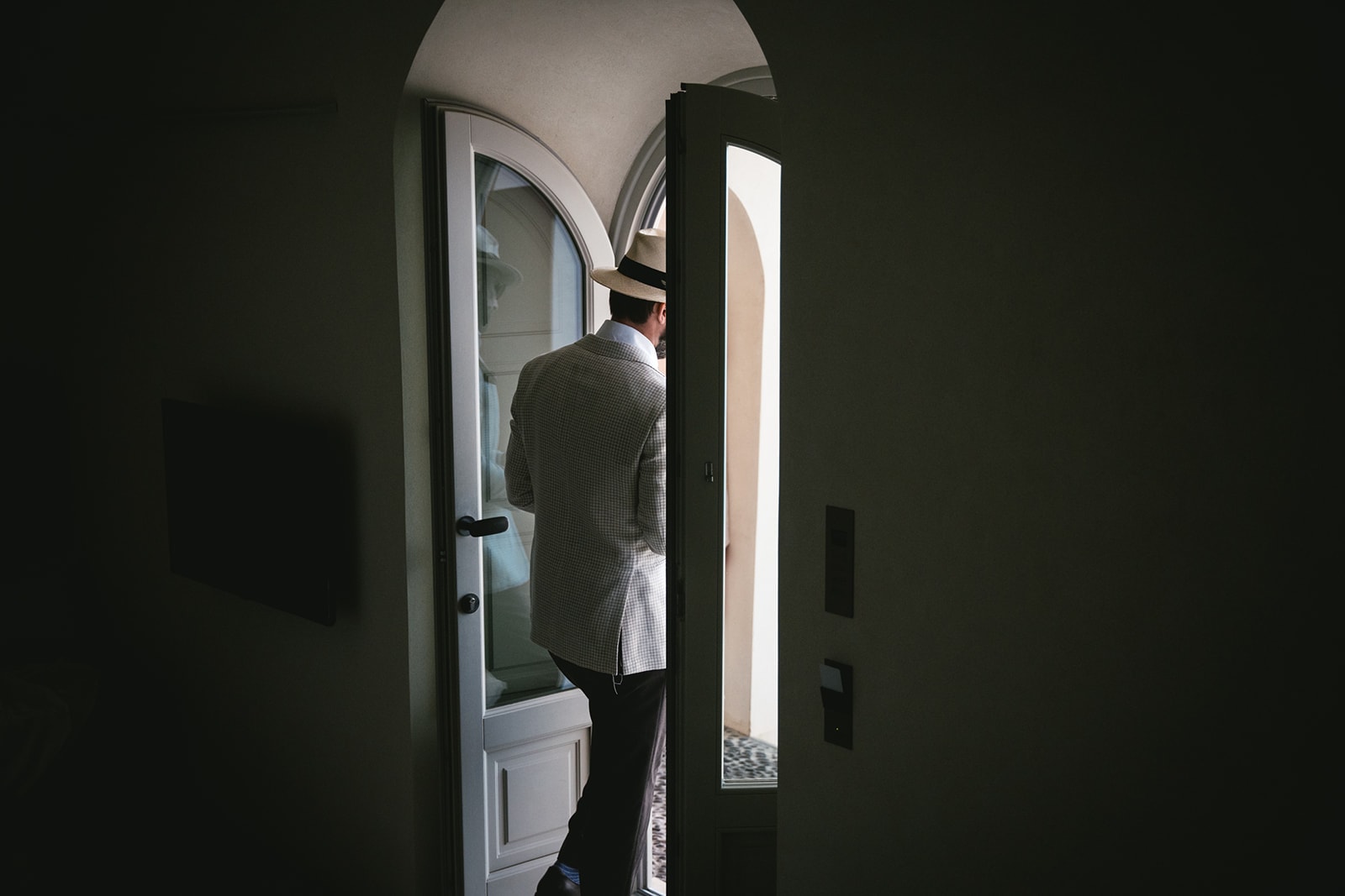 Groom's departure, stepping into the future, elopement on Santorini awaits