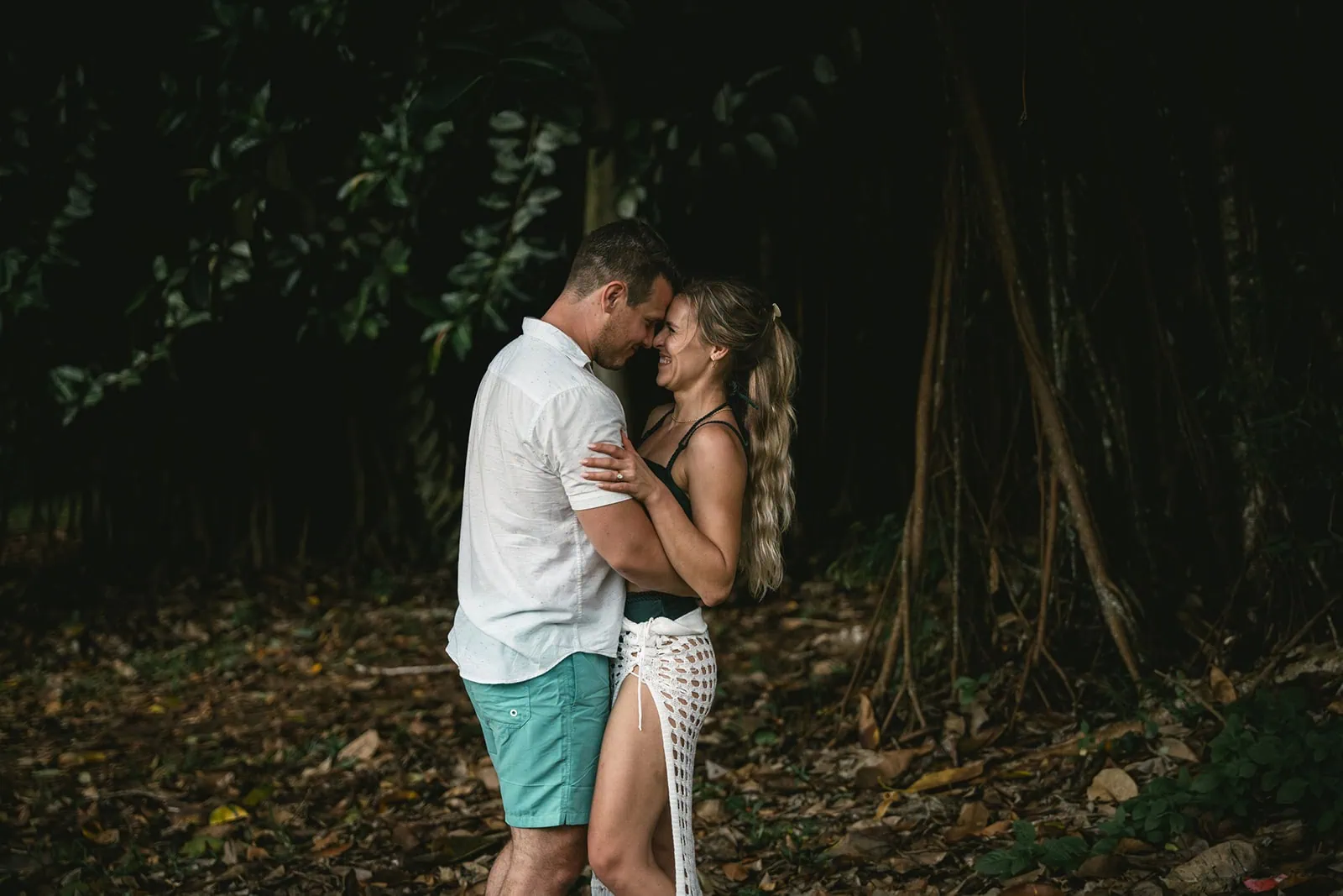 Bride and groom sharing a kiss in French Polynesia