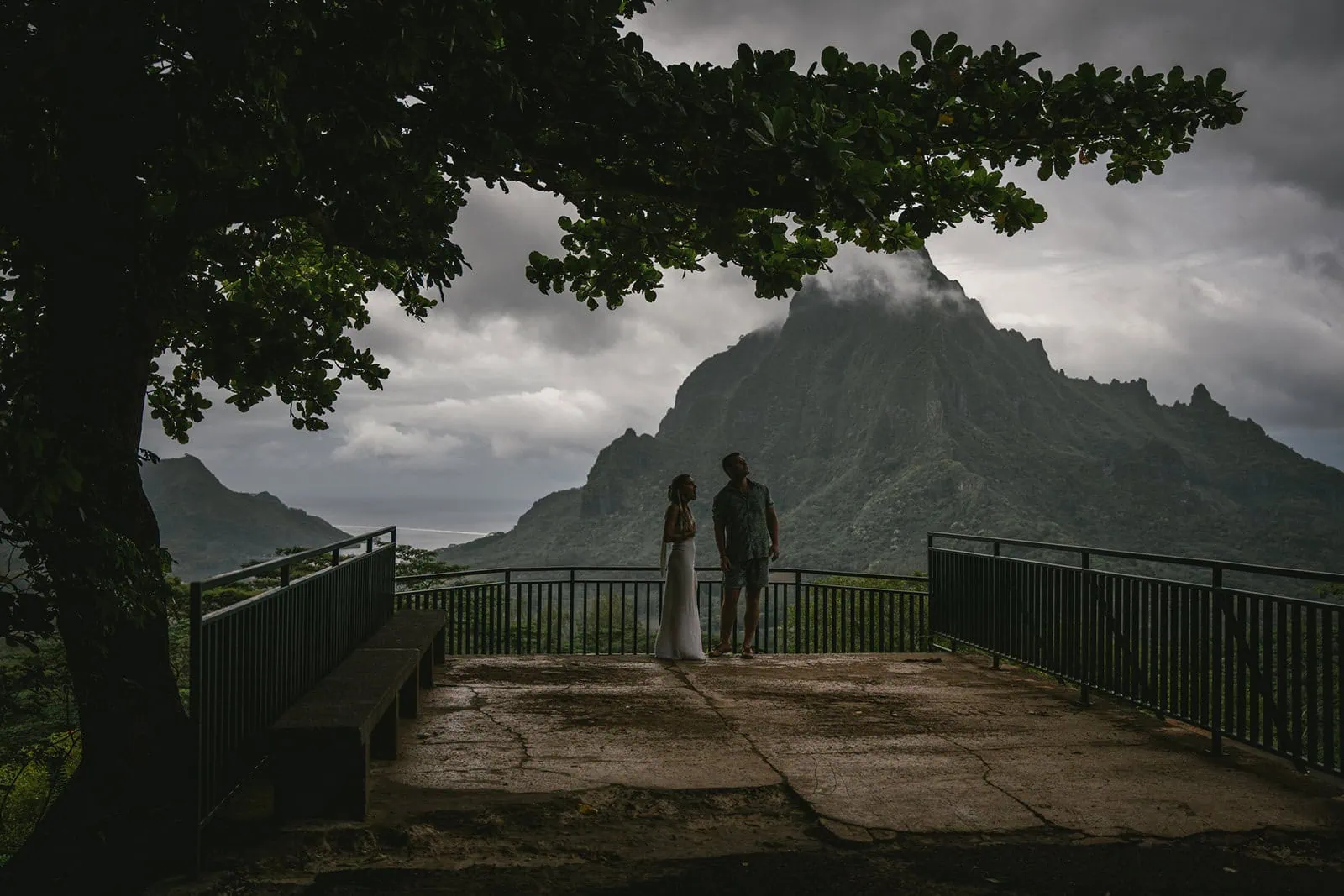 Bride and groom gazing at the view during their elopement in French Polynesia