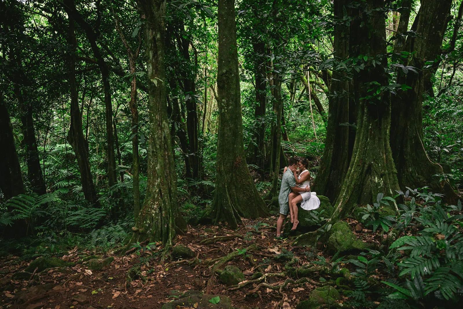 Bride and groom in the forest in their French Polynesia elopement