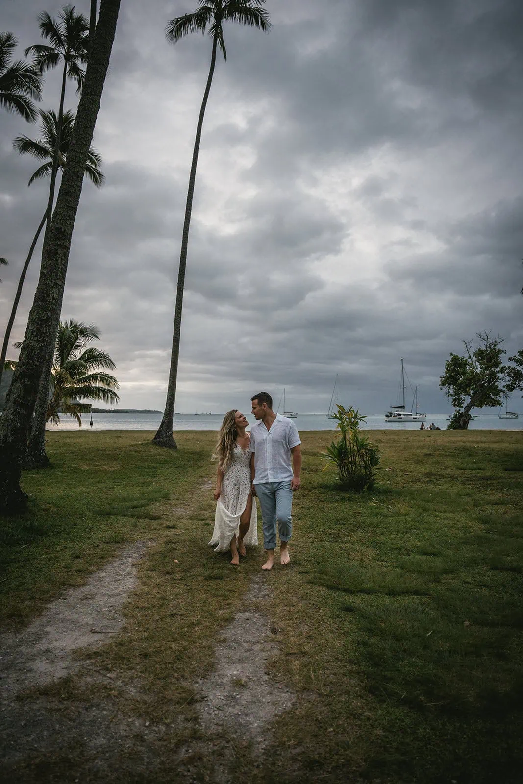Bride and groom walking in French Polynesia