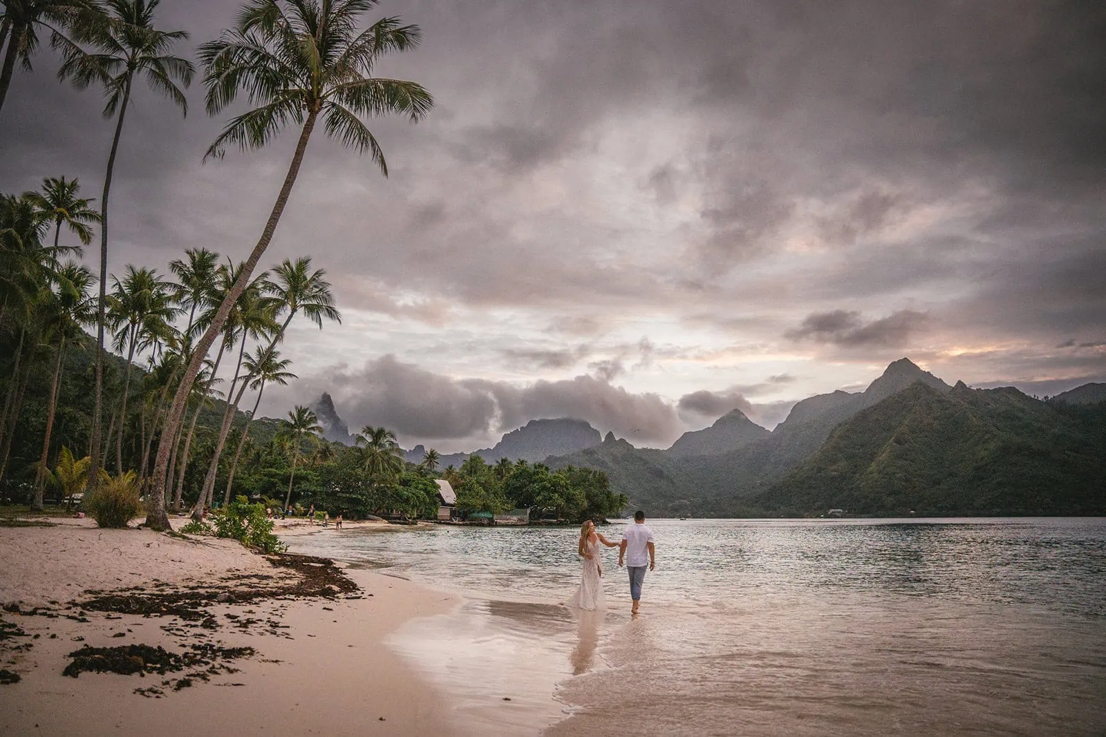 A beautiful Moorea elopement on a beach at sunset