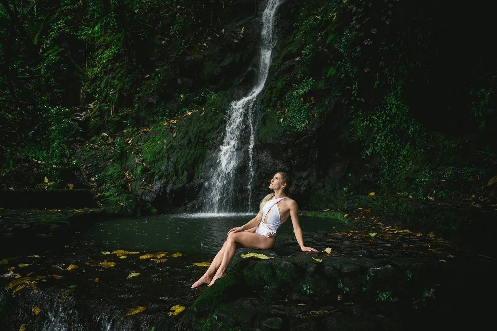 Bride enjoying a waterfall in French Polynesia