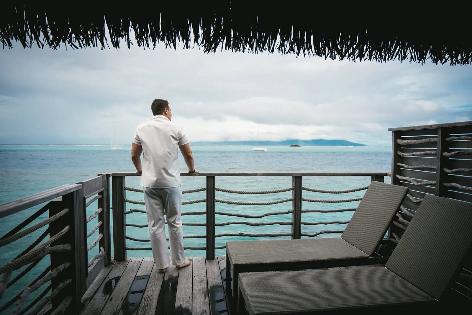 Groom enjoying the view of the Polynesian ocean
