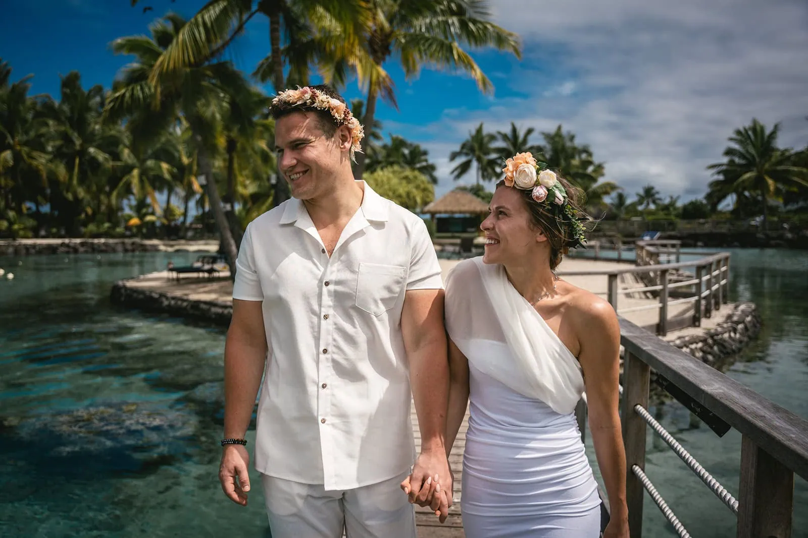 Couple walking hand-in-hand during their French Polynesia elopement