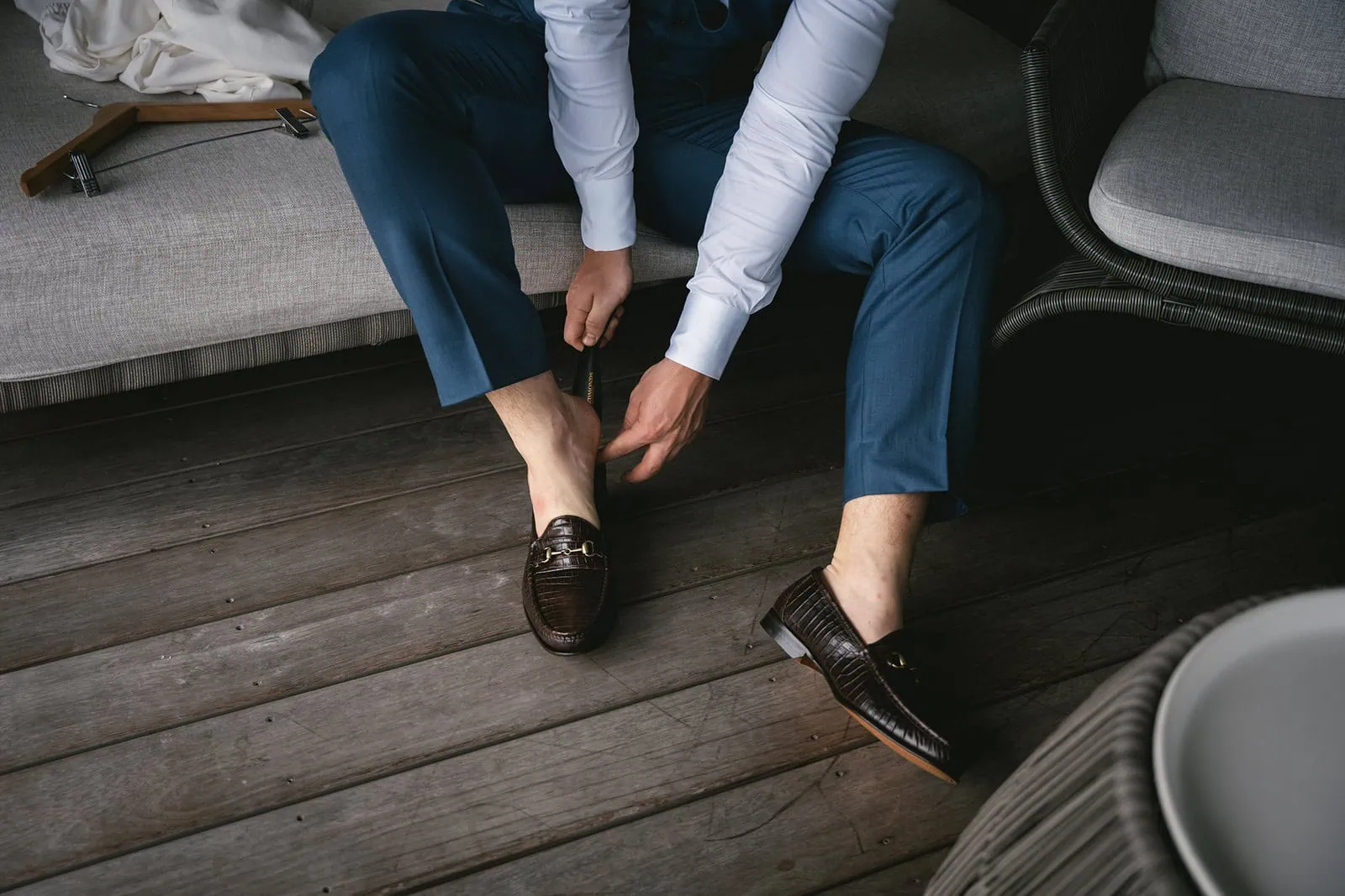 Groom as he prepares for his elopement in French Polynesia