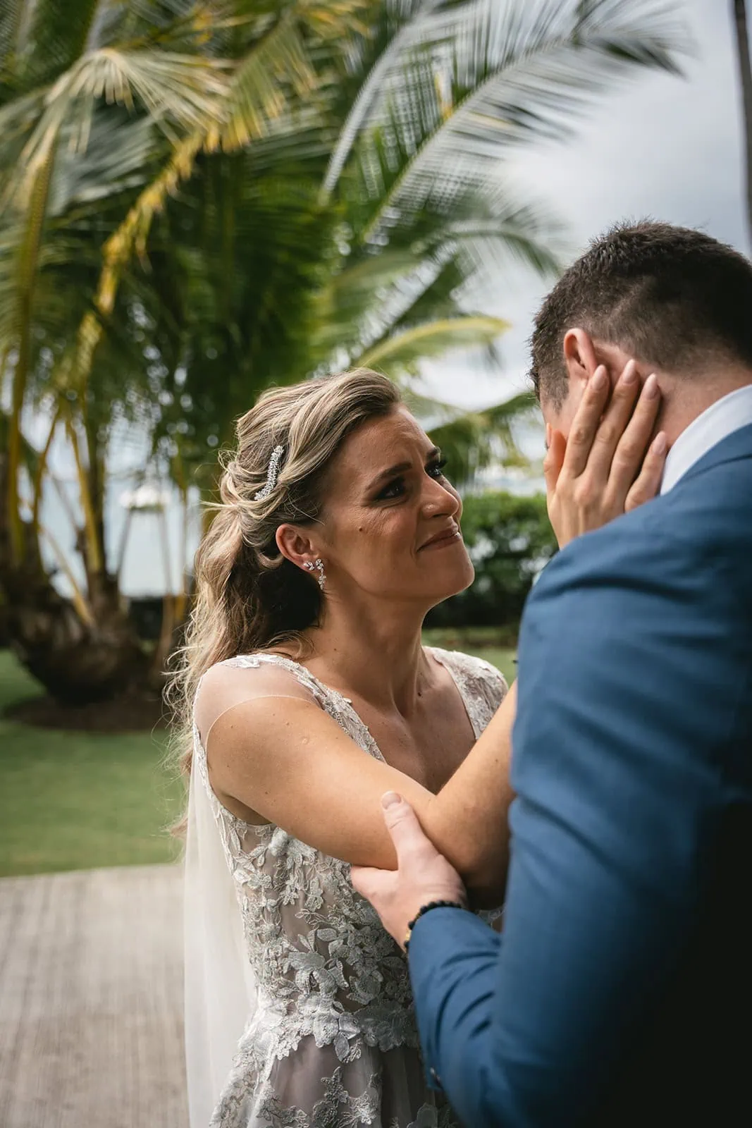 Couple's first look captured in the secluded gardens of their French Polynesia resort