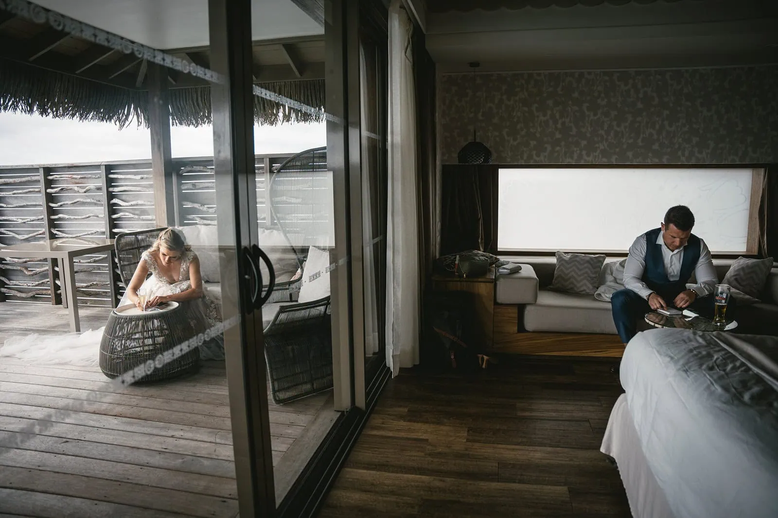 Couple writing their vows in French Polynesia