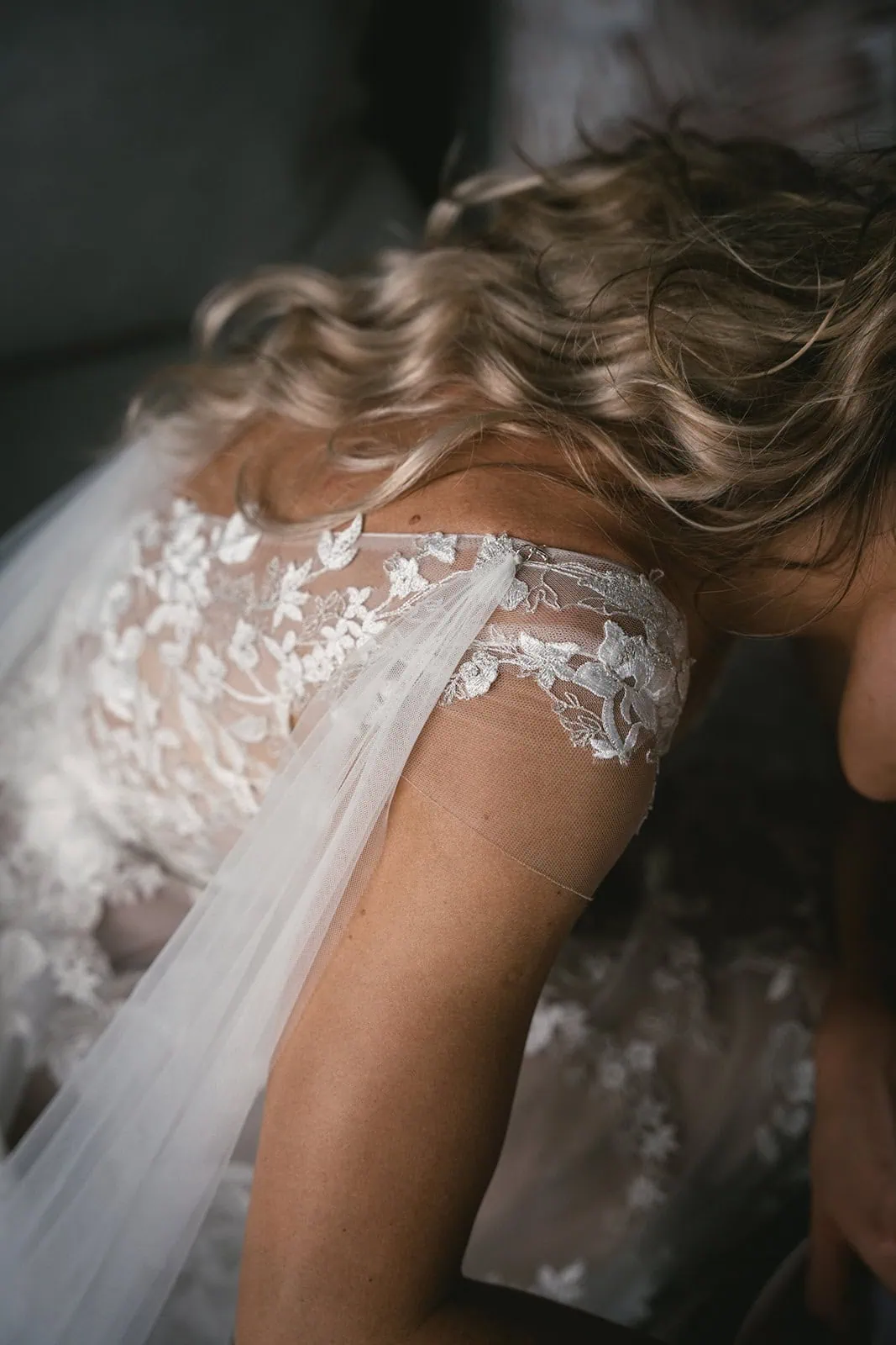 Close-up of a bride's dress during her French Polynesia elopement.
