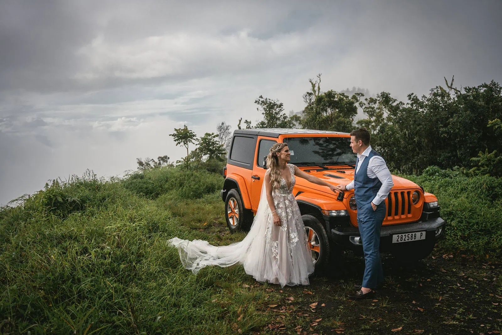 Couple enjoying a private jeep tour during their elopement in French Polynesia