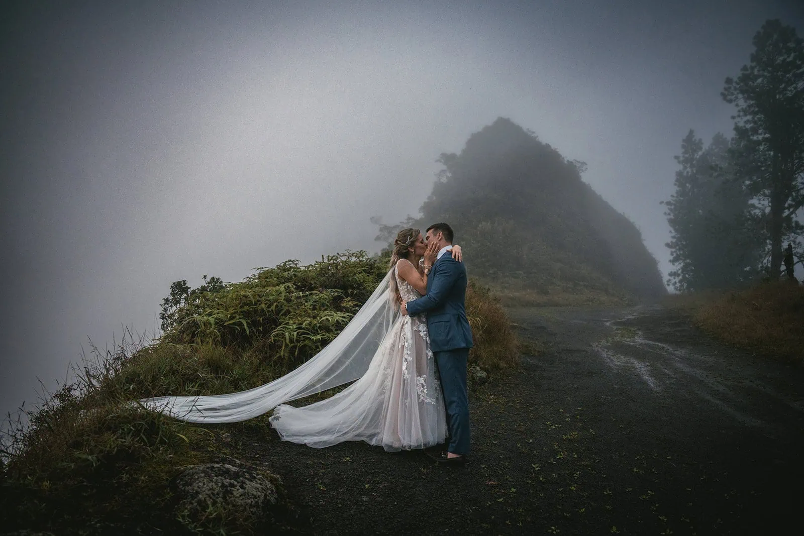 Elopement ceremony viewed from behind, showcasing the mountains of French Polynesia