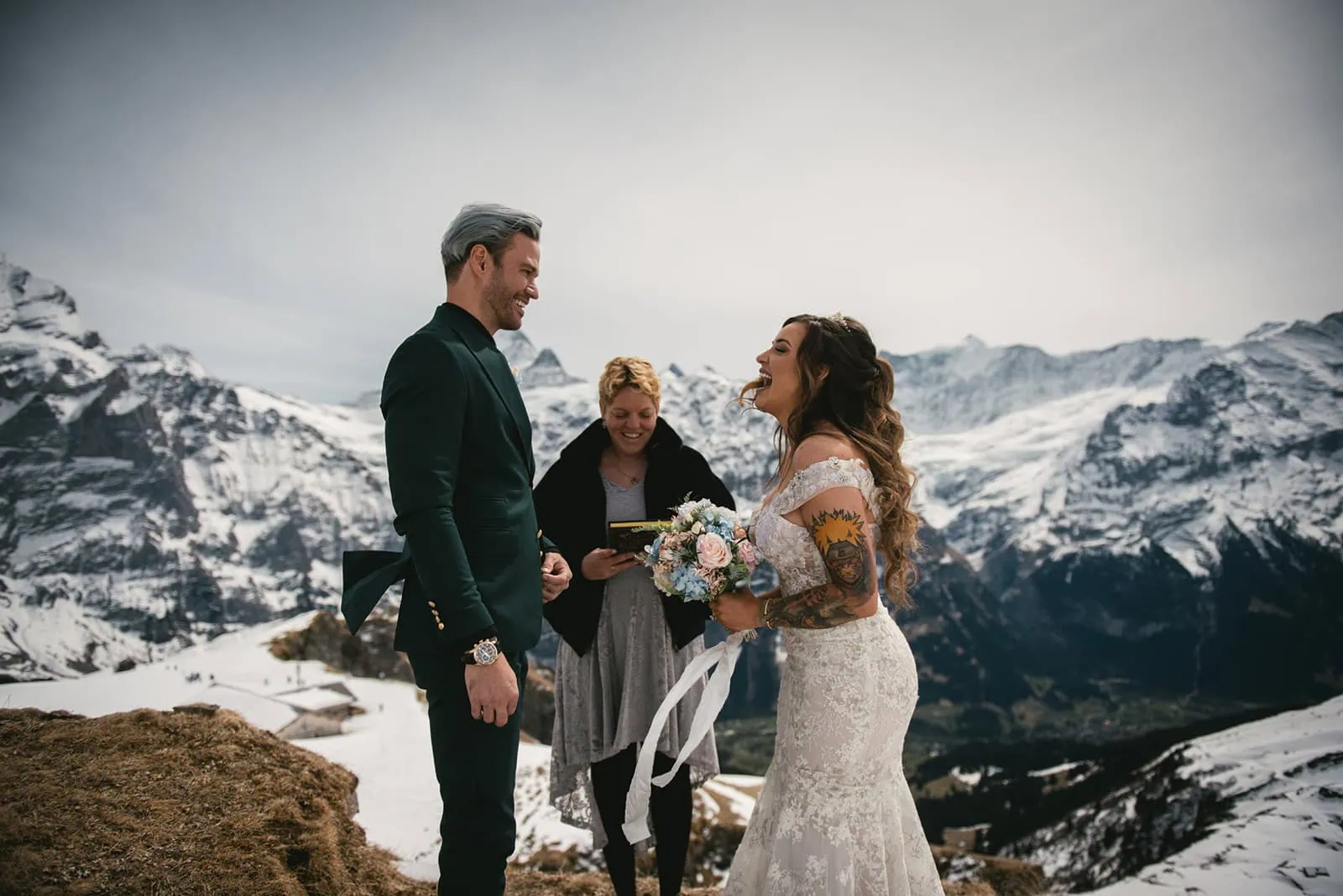 Elopement in the snow with mountain backdrop