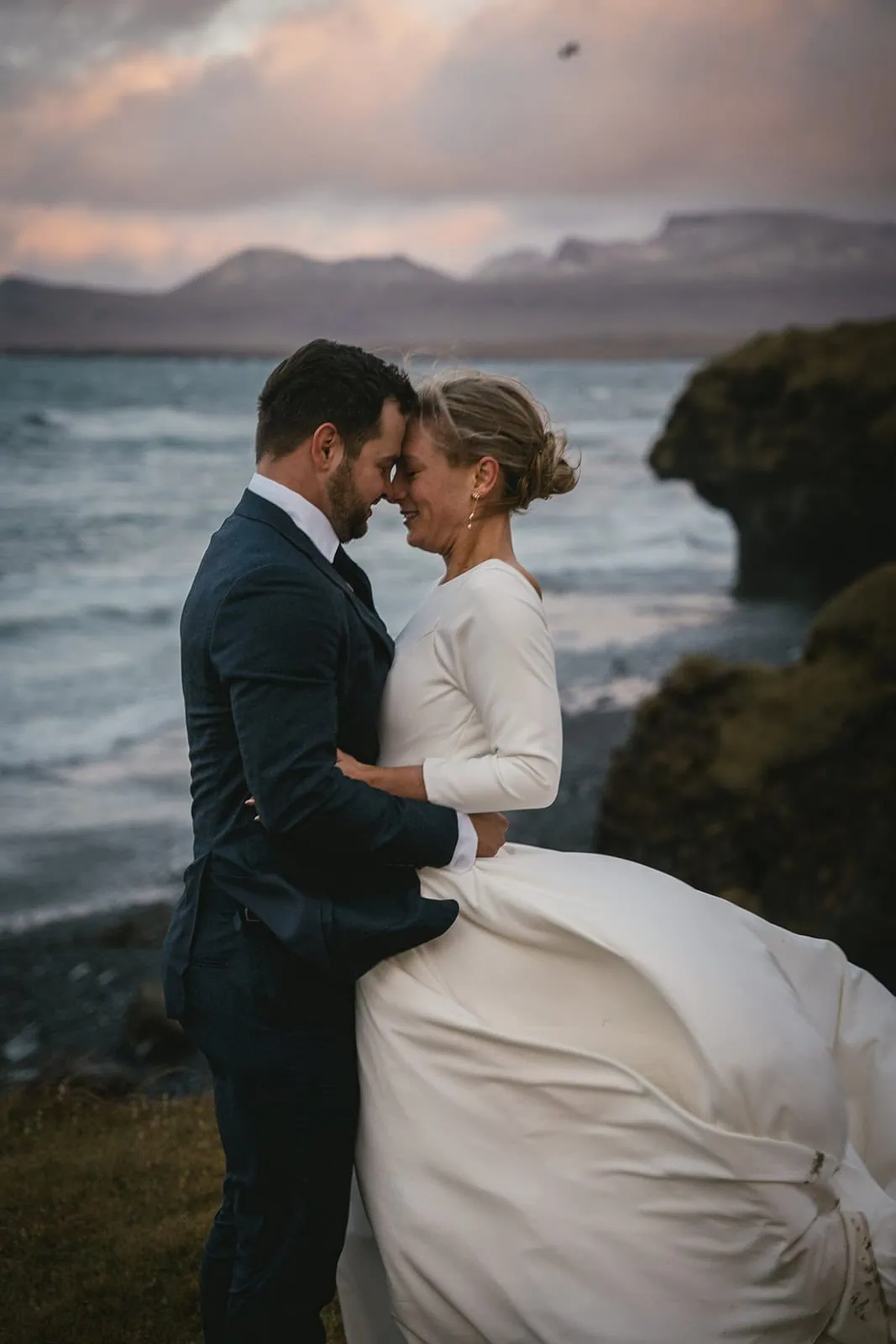 Iceland elopement: Silhouette of a couple at sunset near the sea