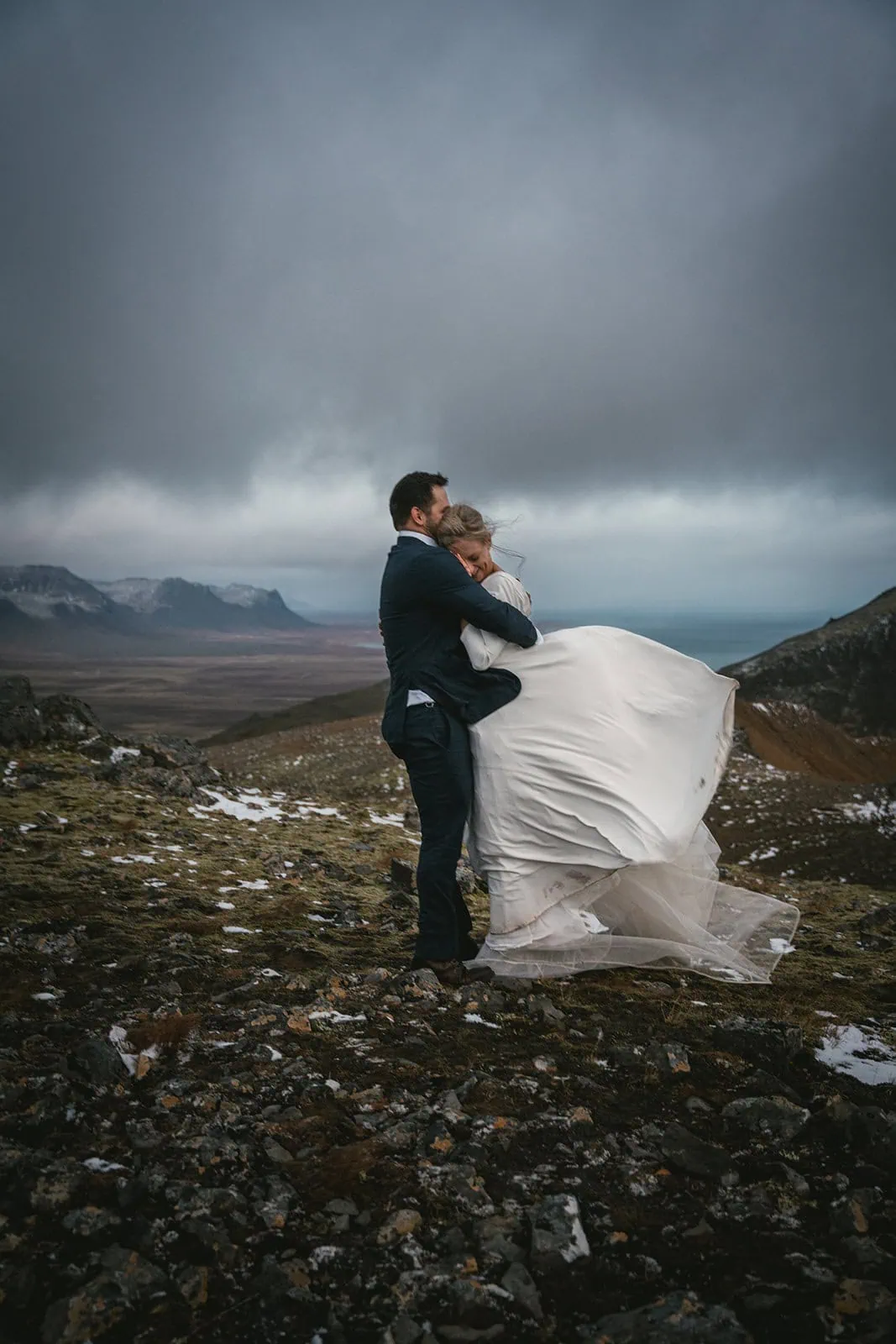 Warm embrace captured during an elopement in Iceland
