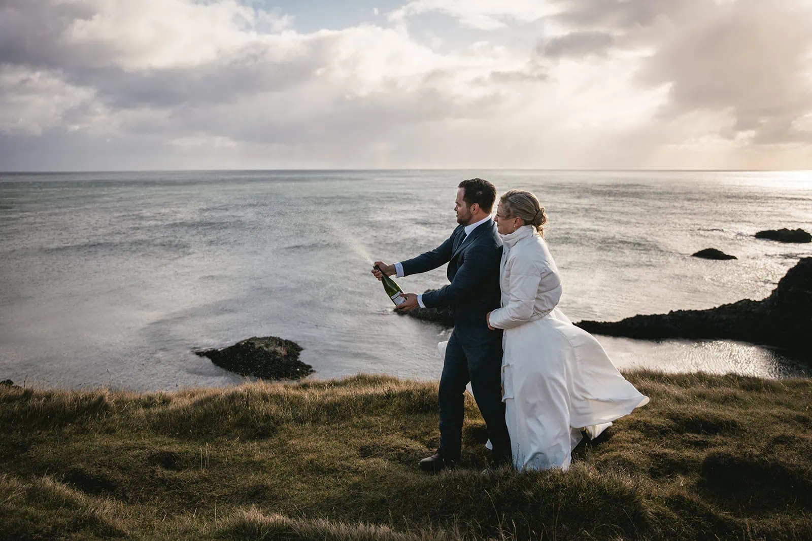 Stunning Iceland scenery with a couple celebrating their elopement